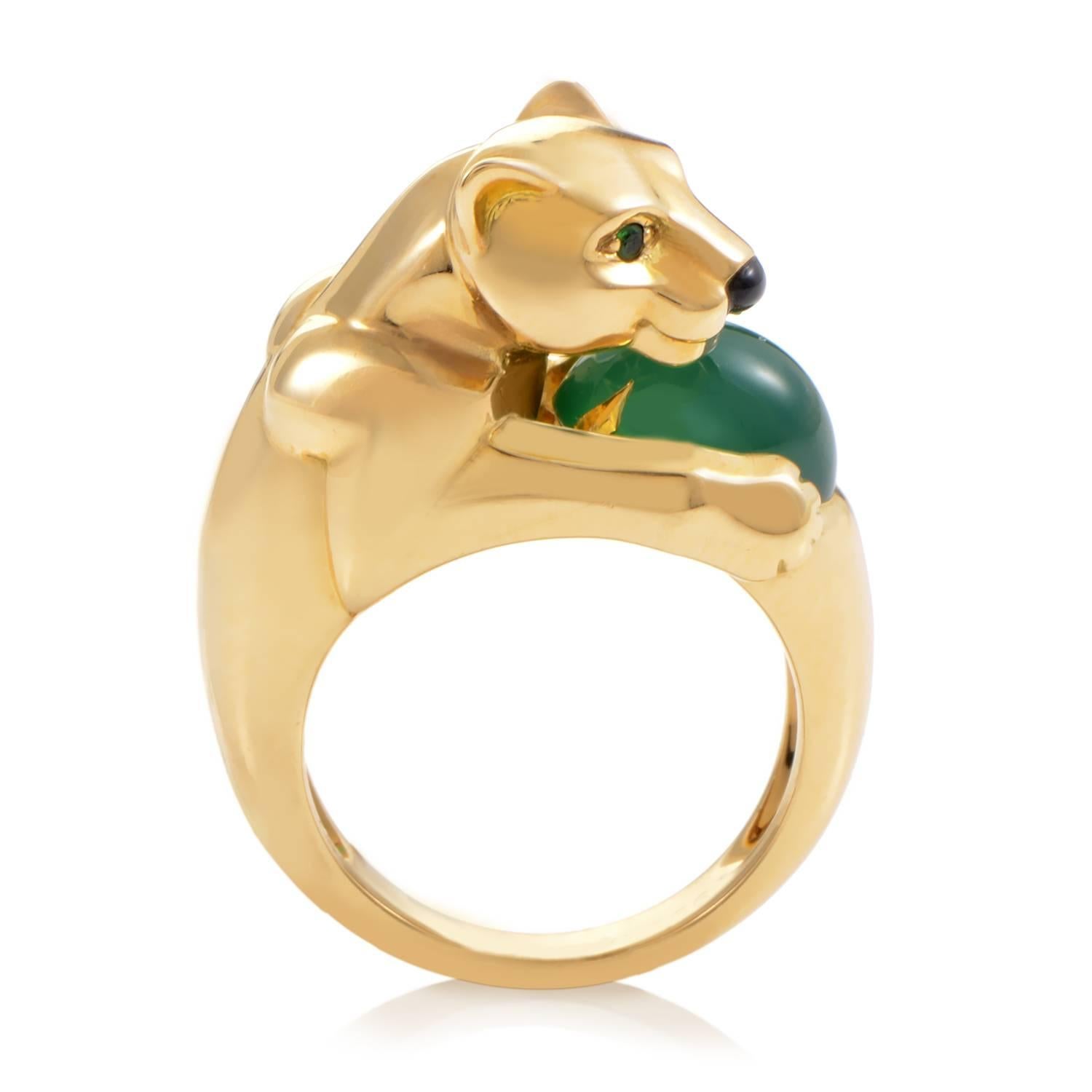A pristine turn of 18K Yellow gold is the masterful starting point of this Cartier ring. The gold broadens in its ascent, eventually rolling into the majestic bust of a panther at its crown. Onyx gives rich substance to the snout, while emeralds add