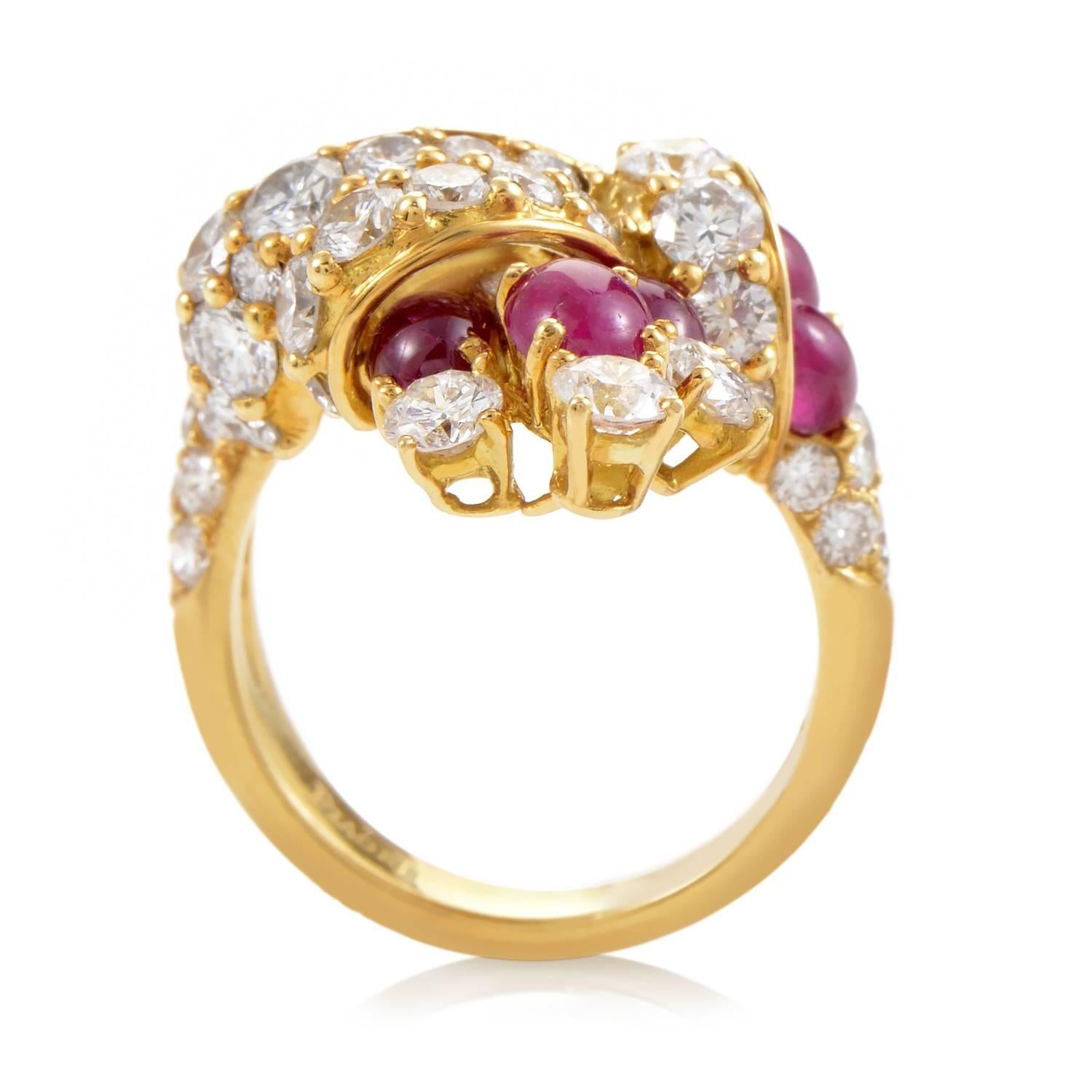 An astounding display of precious gemstones take center stage in this lavish Piaget design. A body made of 18K yellow gold accented with 2.75ct of white diamonds and 2.25ct of rubies creates a showstopping appearance indeed!
Ring Size: 6.25 (52 1/8)