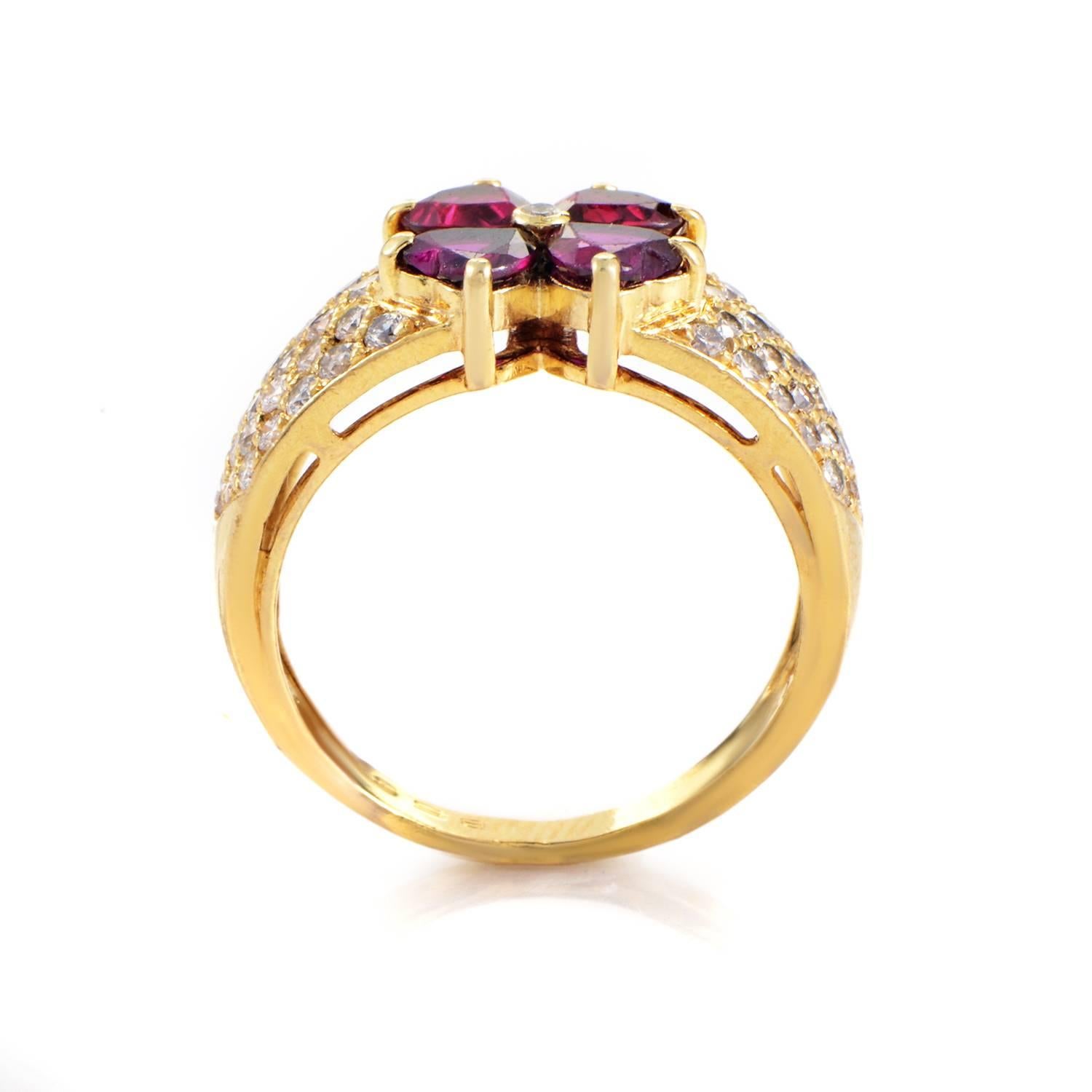 A charming floral motif in this gorgeous 18K yellow gold ring from Van Cleef & Arpels is comprised of heart-shaped rubies amounting to 1.00 carat and glistening diamonds weighing in total 0.85ct for a glaring allure.
Ring Size: 6.5
Included Items: