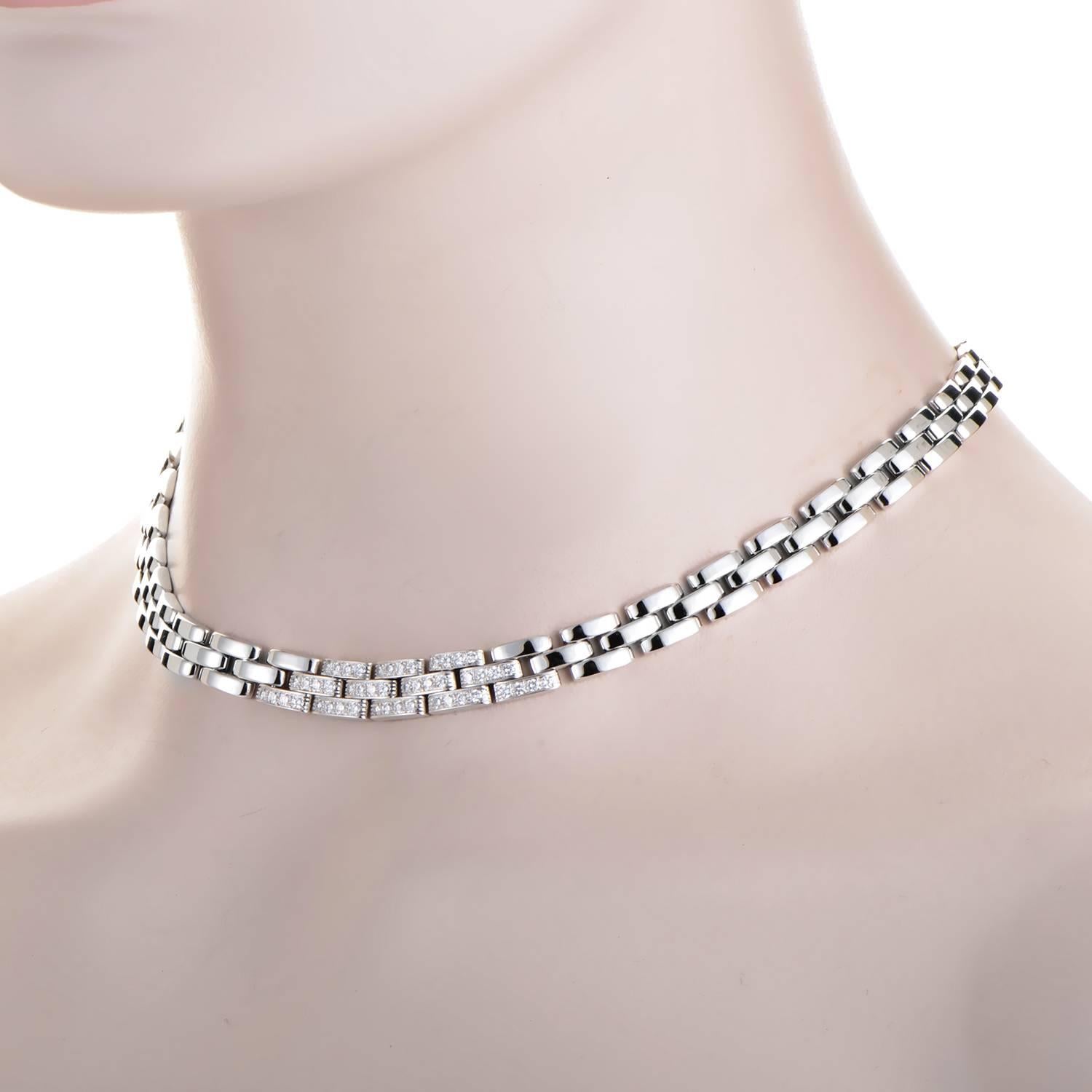 Cartier brings its uncompromising standard in luxury design to this dazzling necklace. The chain makes a clean, concise turn high against the neckline in a rippling 3-tiered stream of 18K White Gold links. Its tide culminates at the front and