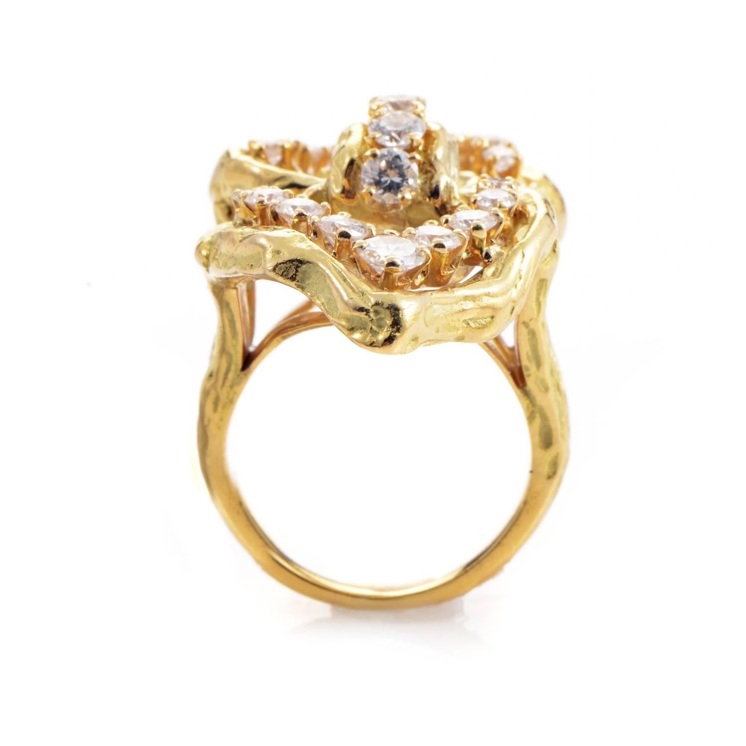 Envisioned and crafted in a marvelously unorthodox manner, the 18K yellow gold in this remarkable ring from Chaumet exudes an irresistible aura of realistic imperfection, embellished along its crooked contours with diamonds totaling 1.65