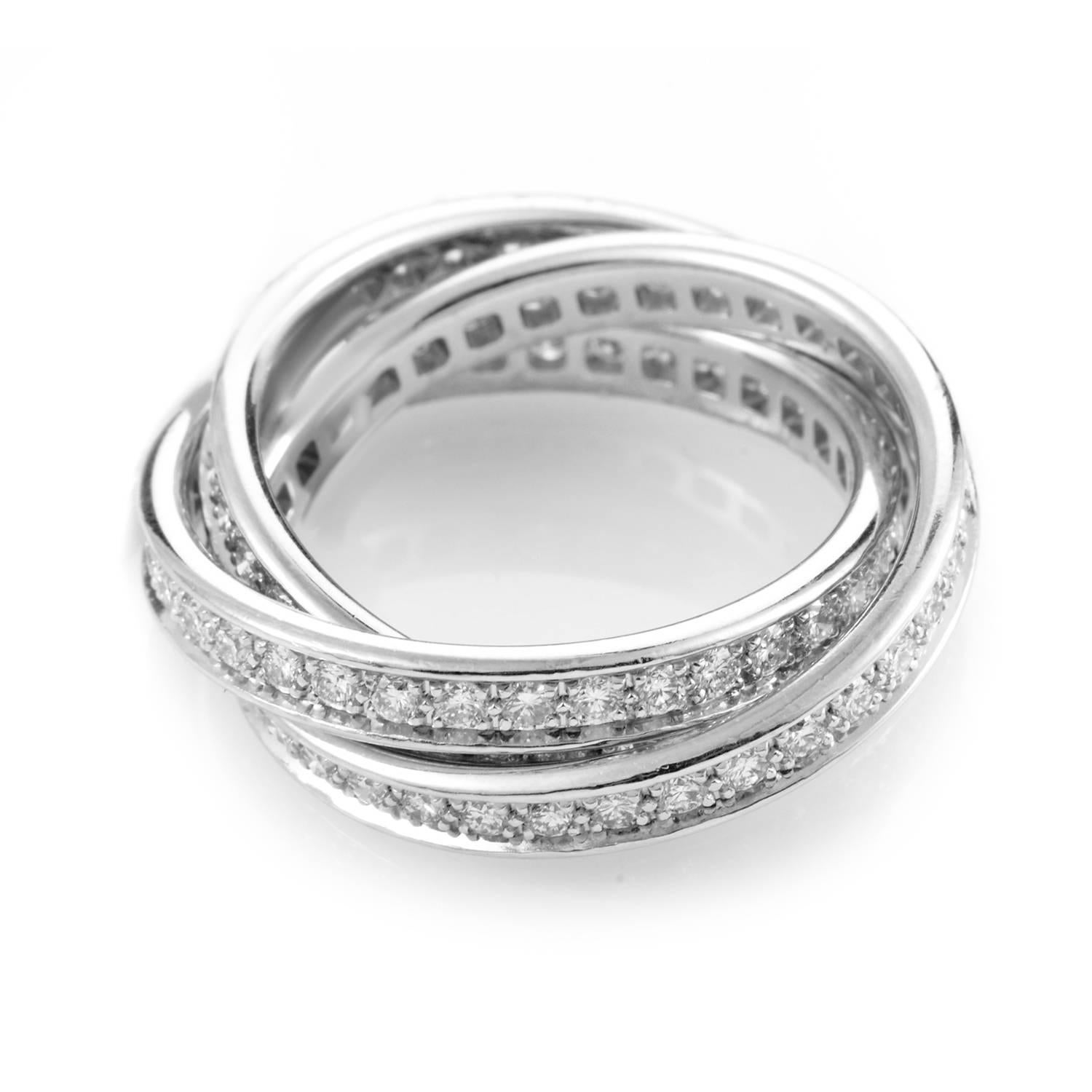 Cartier's Trinity collection is world renowned for symbolizing timeless and never ending love. This three band ring from the collection is made of 18K white gold and is set with glittering white diamonds. Absolutely gorgeous!
Included Items: