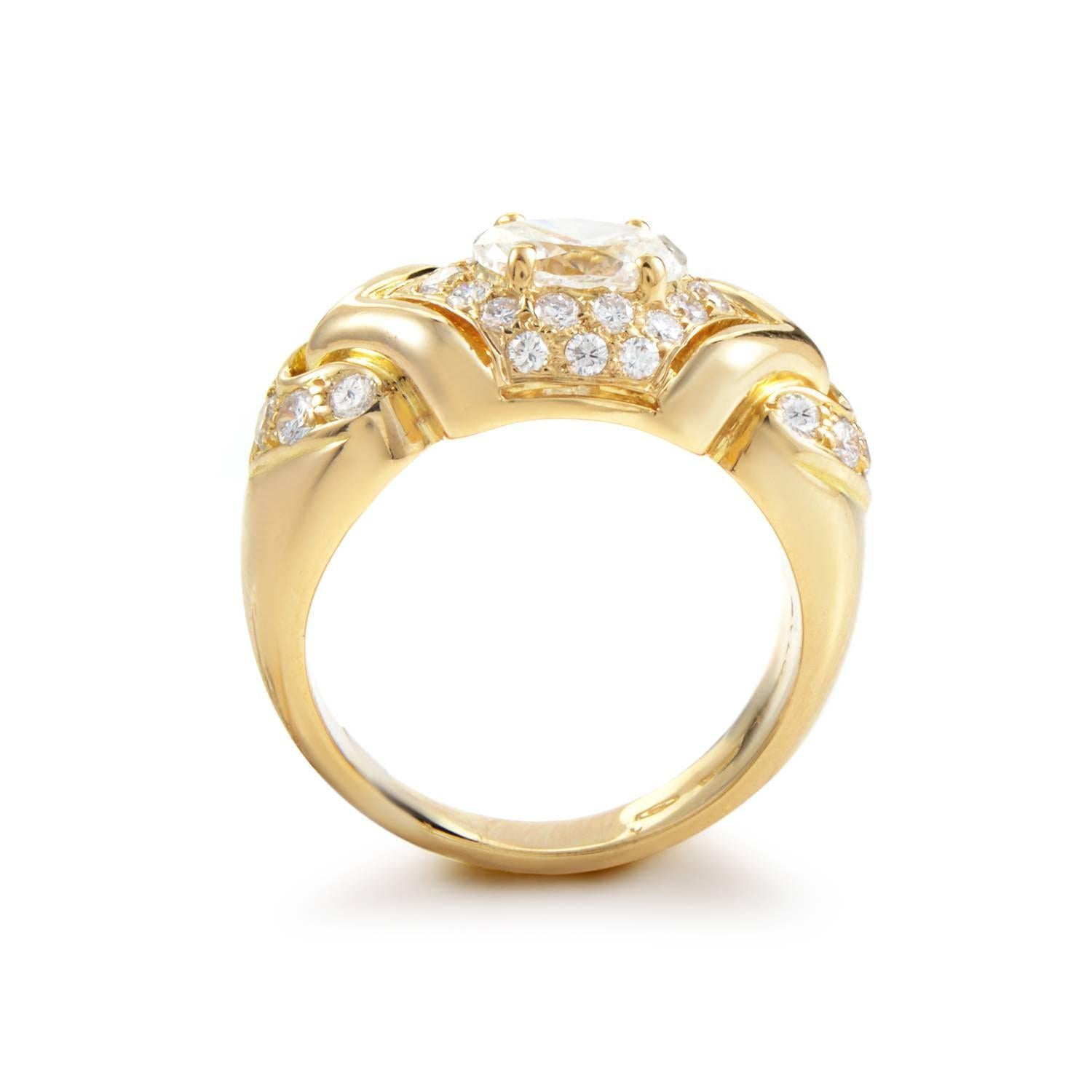Eye-catching glare and glamorous allure make this exceptional ring from Bulgari a truly magnificent sight to behold, with the warm radiance of 18K yellow gold complemented brilliantly by the vivacious sparkle of diamonds totaling 0.35ct and a