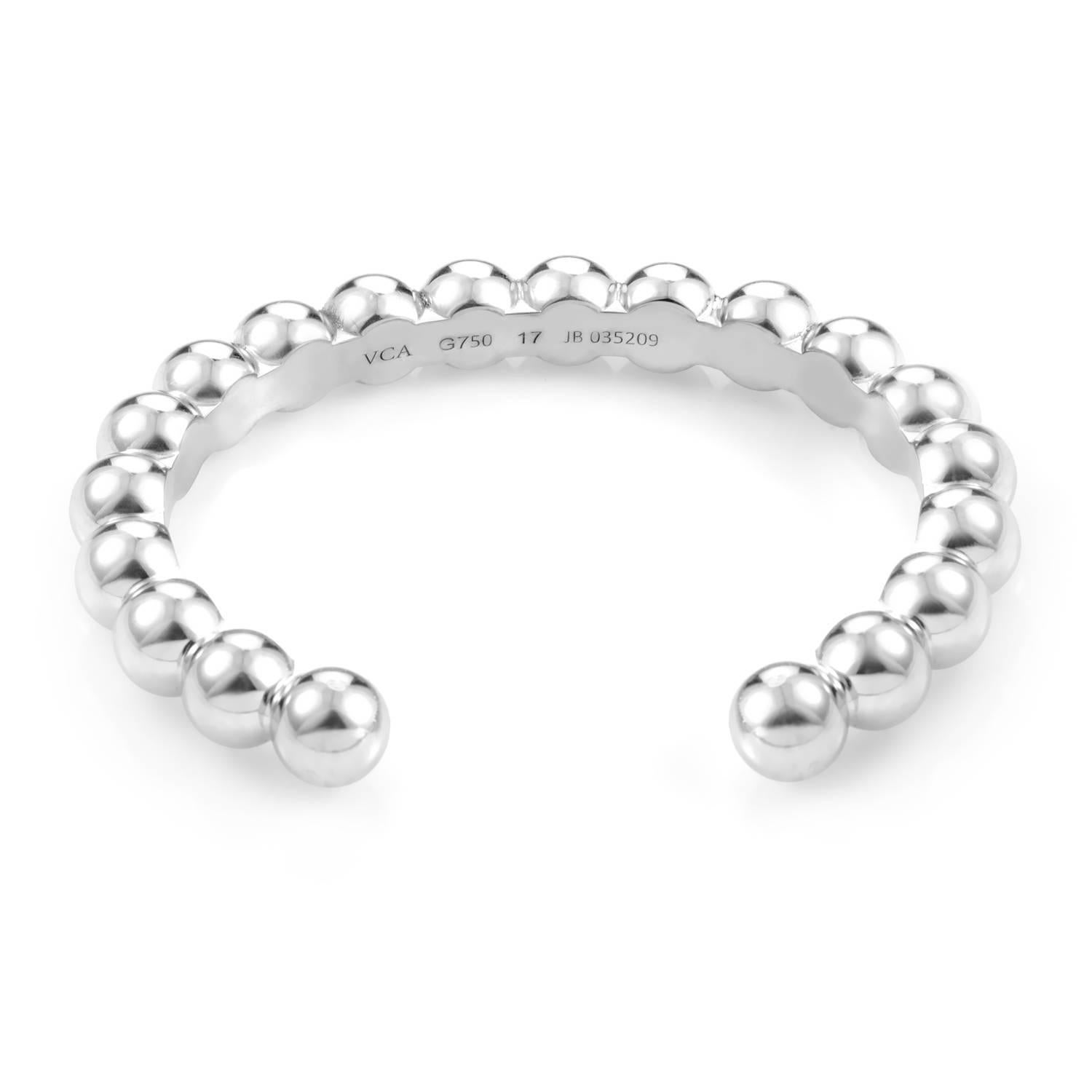 This charming bangle by Van Cleef & Arpels is made with crisp 18K white gold and shimmers in its bead chain design while perfectly curved to fit to one's wrist.
Retail Price: $13,500.00 (Plus Tax)