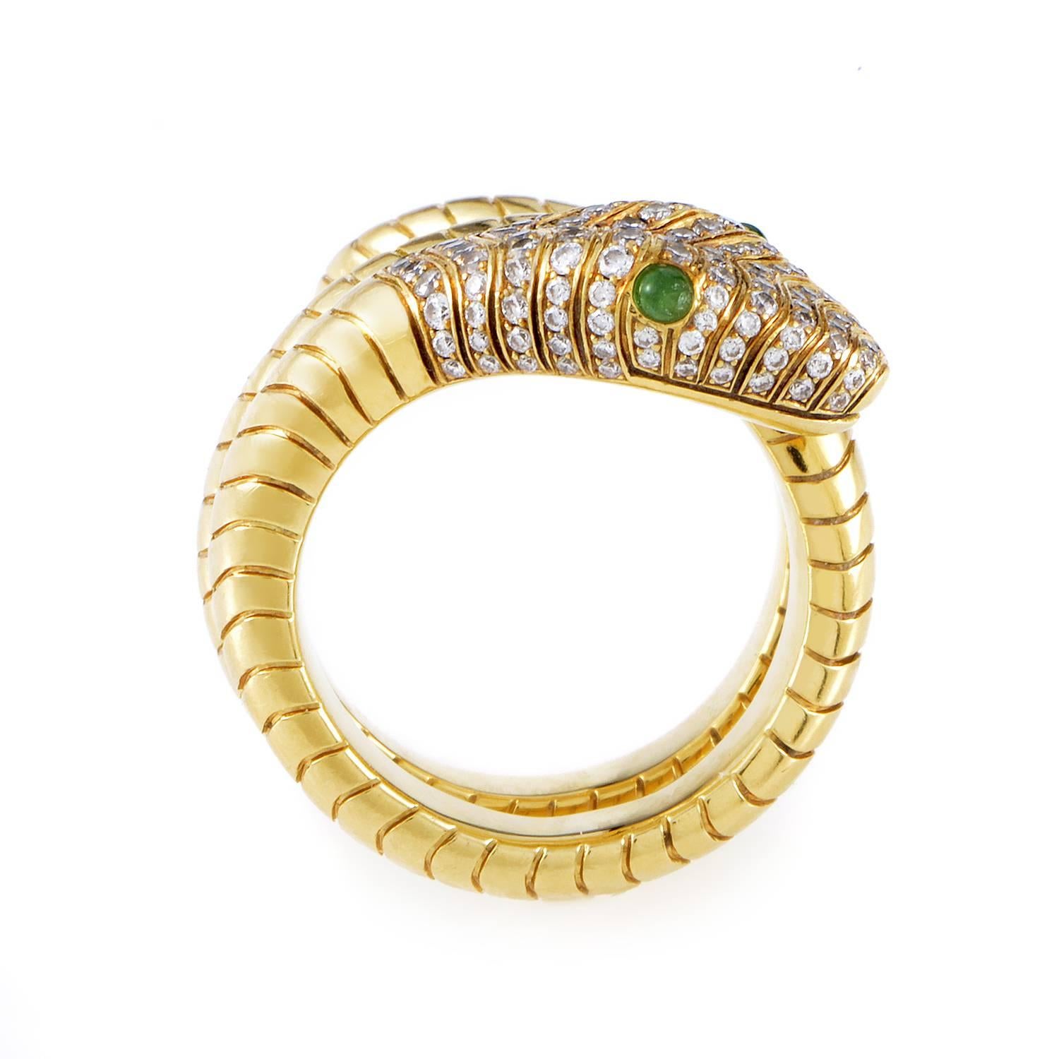 Curling around your finger in graceful and gleaming fashion, this offbeat ring from Asprey assumes the intriguing form of an 18K yellow gold snake embellished with 0.60ct of glittering diamonds at the top of its head while boasting two delicate