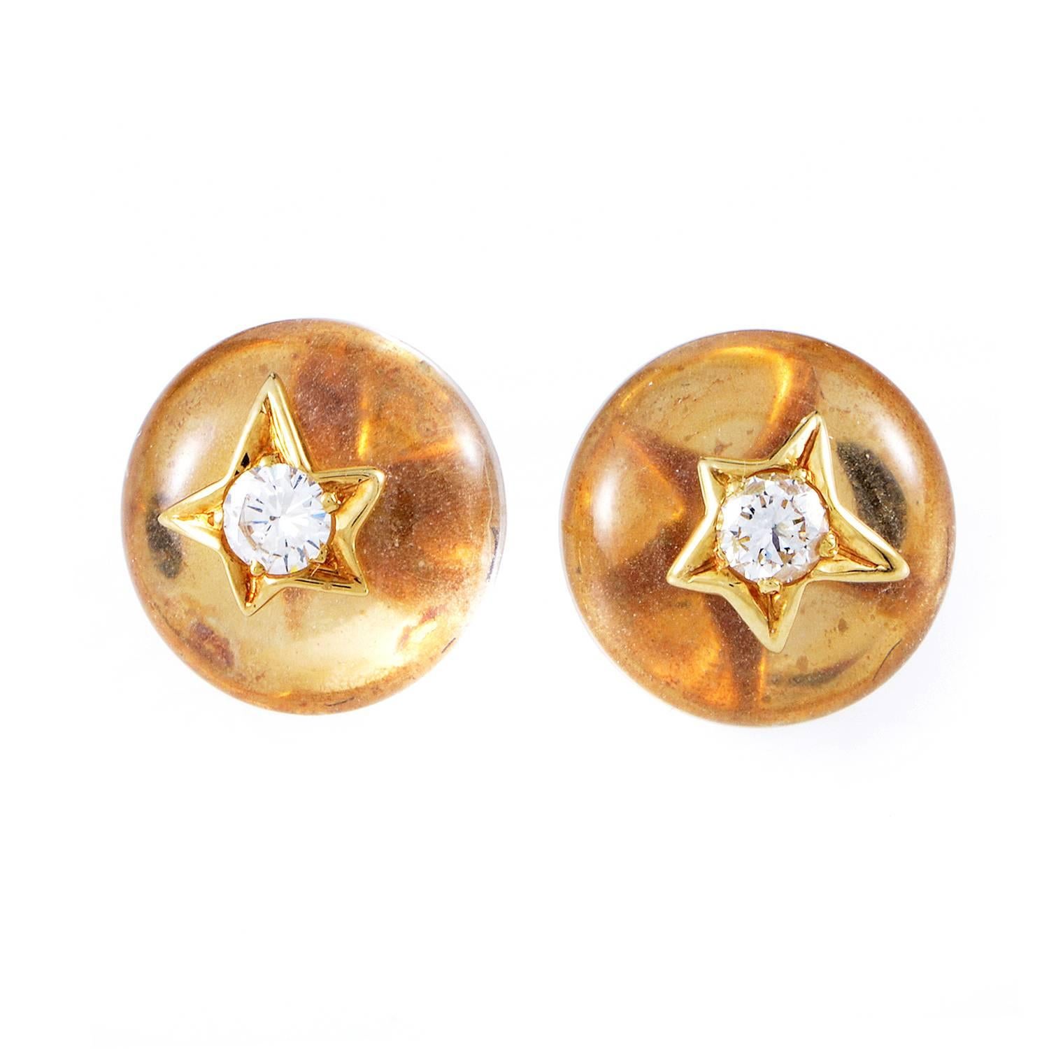 Made of 18K yellow gold and assuming an adorable shape, these splendid earrings from Chanel boast wonderful crystals and the brand's recognizable motif of a star, each embellished with a marvelous diamond, bringing the total weight to 0.20ct of