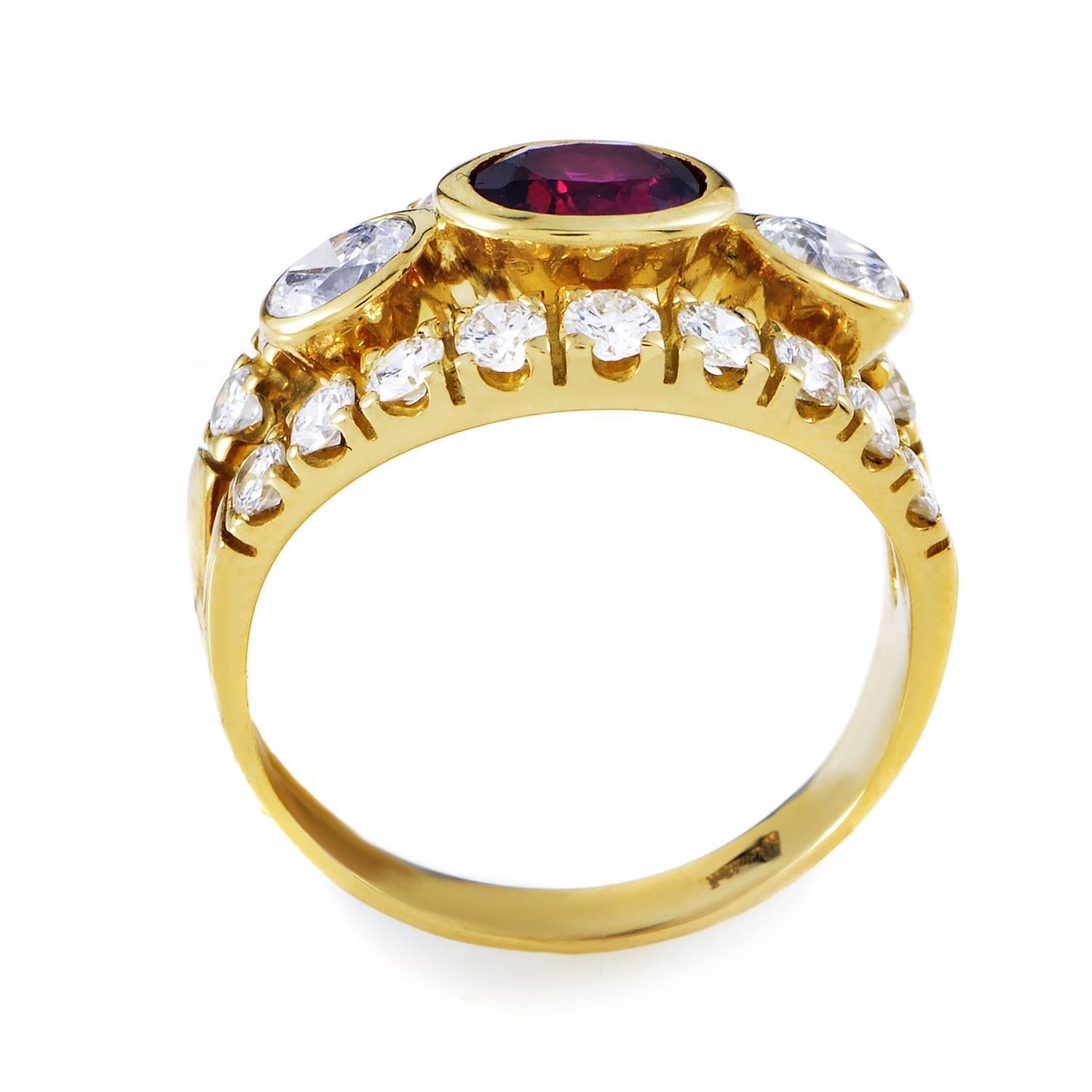 Upon the very first sight of this exceptional ring from Damiani all attention is drawn to the majestic ruby weighing 1.00 carat, sitting at the top of a magnificent design comprised of 18K yellow gold and the wonderful sparkle of diamonds totaling