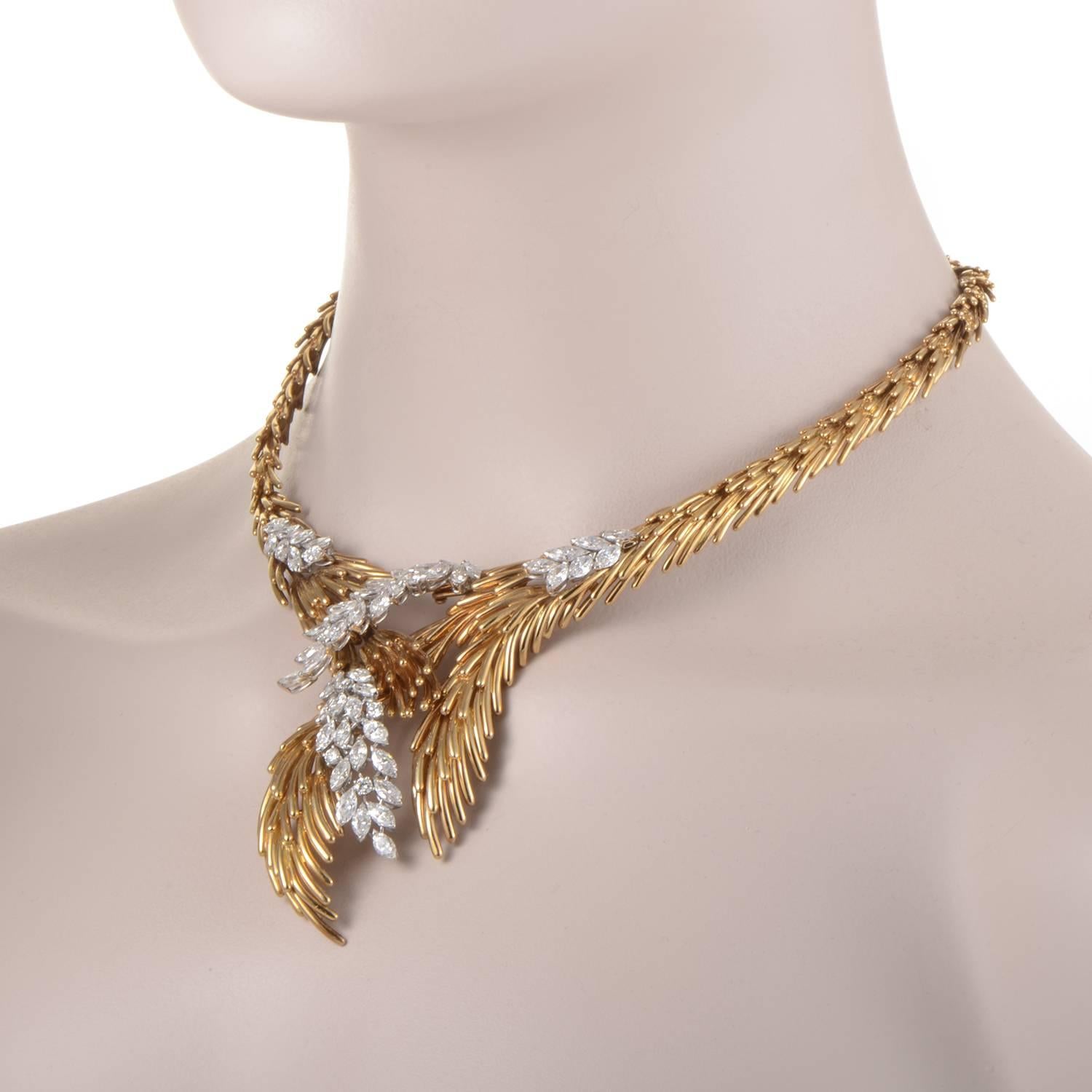 This ethereal necklace by Spritzer & Furman is a superb example of style and grace. A deluge of 18K yellow gold flows around one's neck with a cascade of approximately ~14ct of diamonds in 18K white gold settings completing the otherworldly