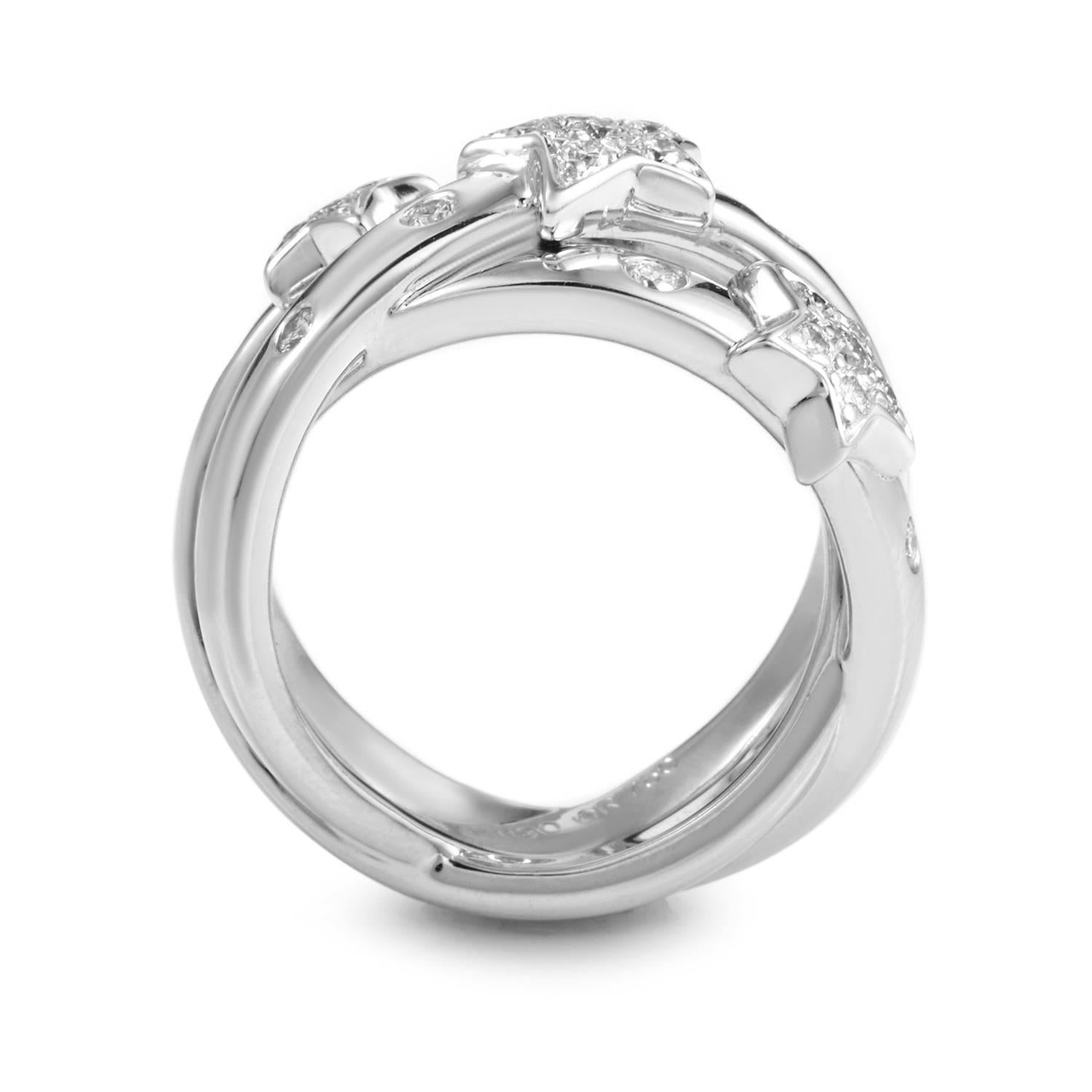 A complex and intriguing shape embellished with the esteemed brand's recognizable comet motif, this magnificent ring from Chanel boasts brilliant diamonds totaling 0.50ct that blend perfectly with 18K white gold to produce fascinating shimmering