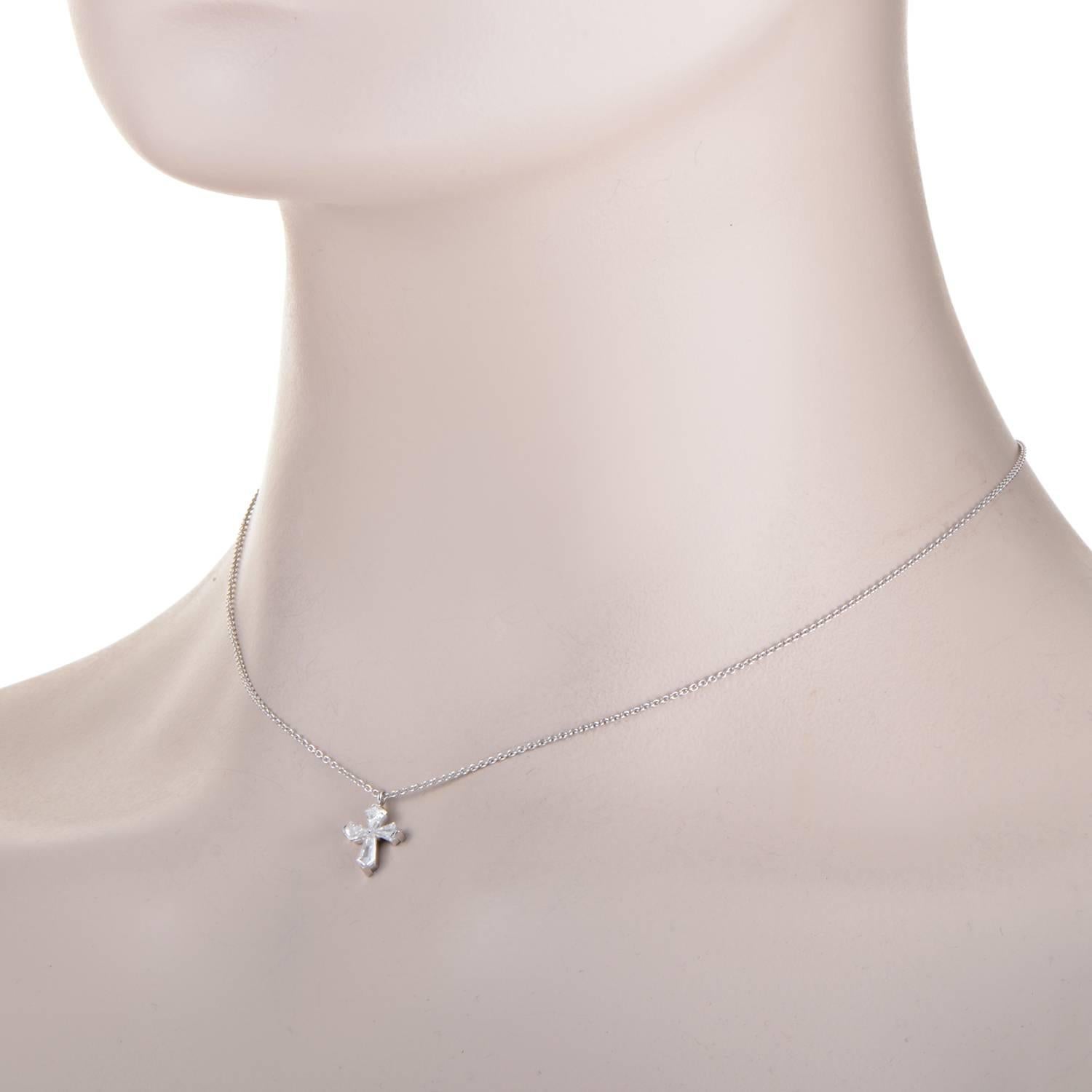 The powerful and alluring symbol of a cross is given an irresistible prestigious glare by the marvelously cut diamonds weighing in total approximately 0.75ct in this astonishing 18K white gold necklace from Graff.
Included Items: Manufacturer's