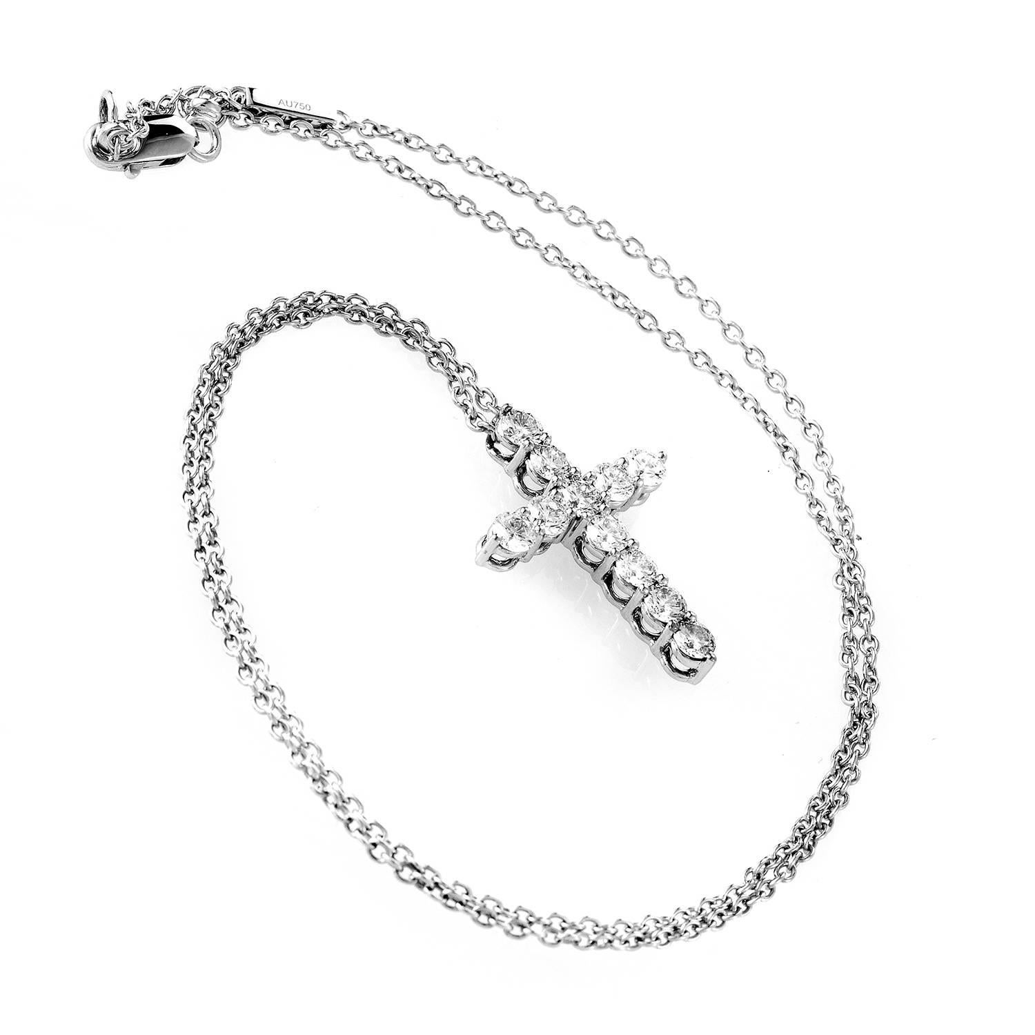 A symbol of grace cast with luxurious style. This cross pendant necklace from Graff bursts with 1.75ct diamonds. Their pronounced settings ripple through a meticulously crafted junction of 18K White Gold. The pendant measures one inch, and is