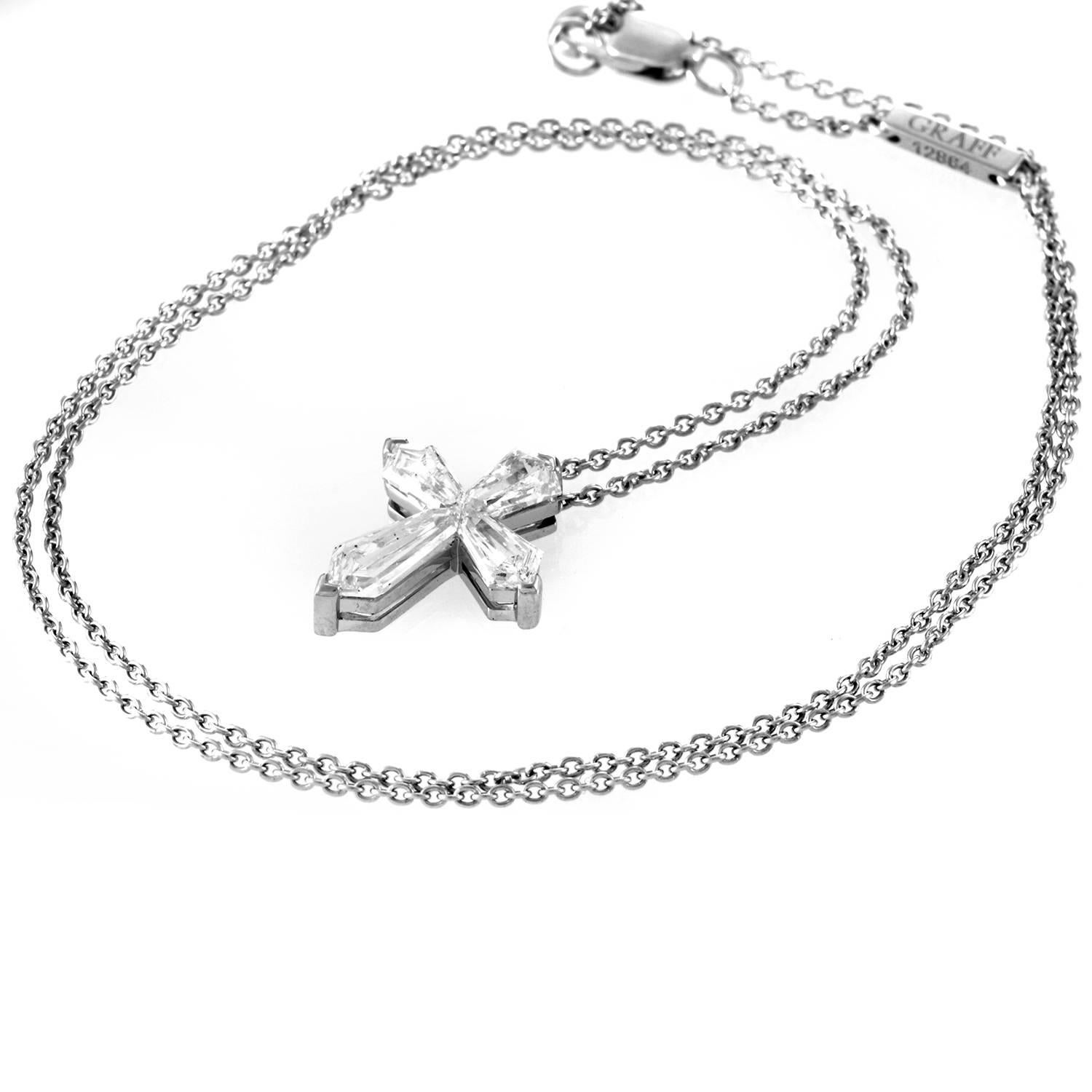 Diamonds provide shimmering presence to this compelling pendant necklace from Graff. The 1.25ct diamonds are bullet cut for a dynamic, tapering line, its four points converging into a cinching bow at the center. The precious stones shaping the cross