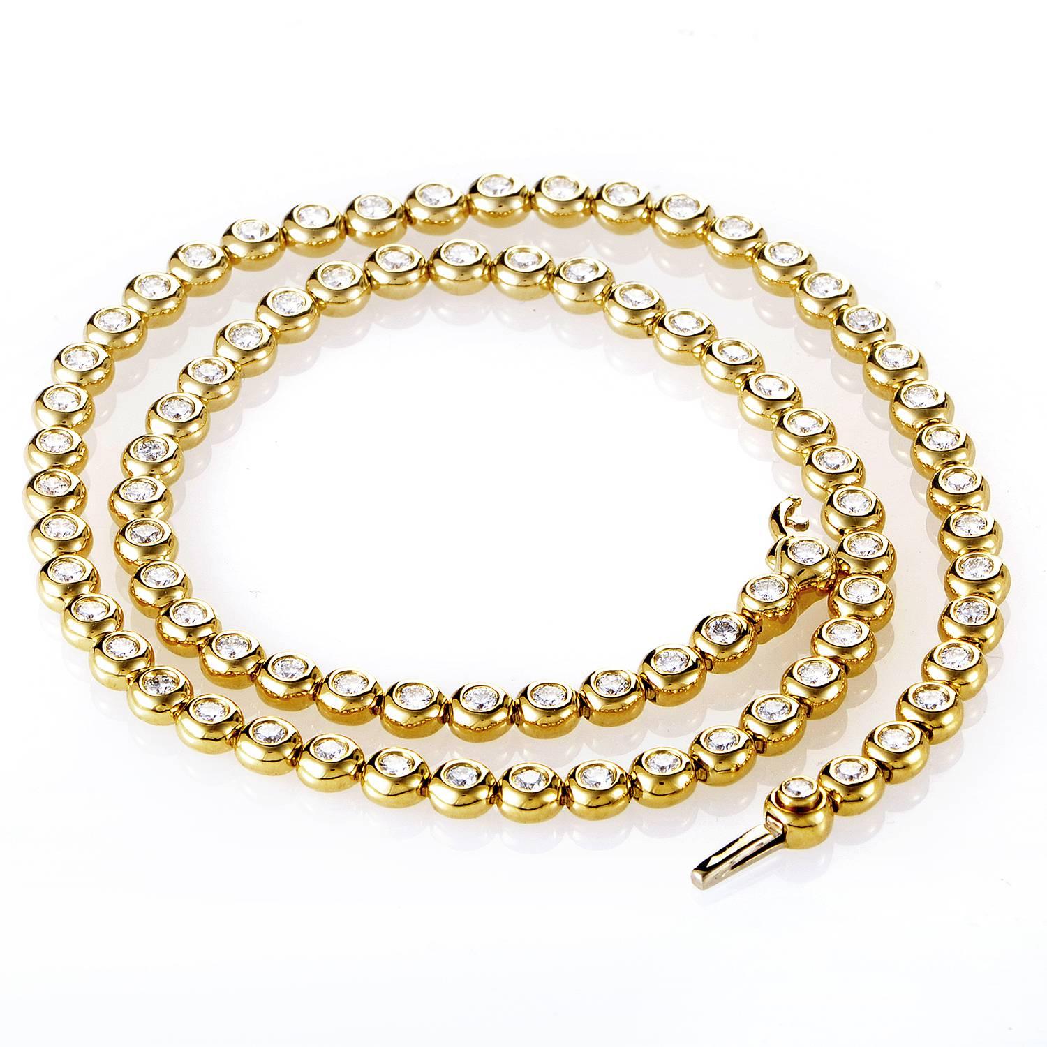 A rippling stream of precious ingredients pours in perfect harmony in this elegant necklace from Tiffany. A series of smooth, segmented rivulets of 18K Yellow Gold drop in fluid formation. Each segment shares the task of harboring 6.50ct diamonds.