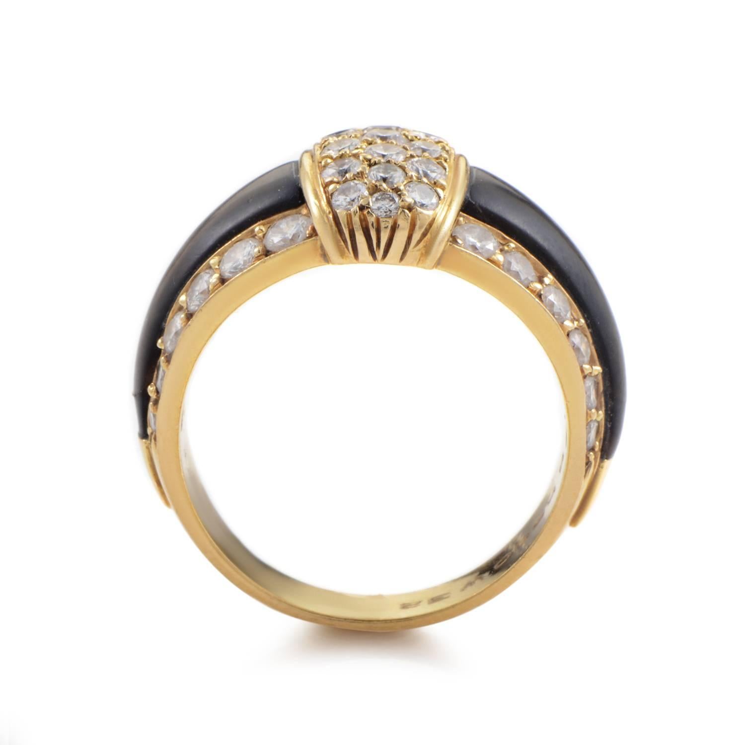 An exotic splash of oceanic mystique completes this ring design from Van Cleef & Arpels. The band rises in 18K Yellow Gold, gaining a bold expanse in its ascent. The band's center is filled with the iridescence gloss of black mother of pearl. The