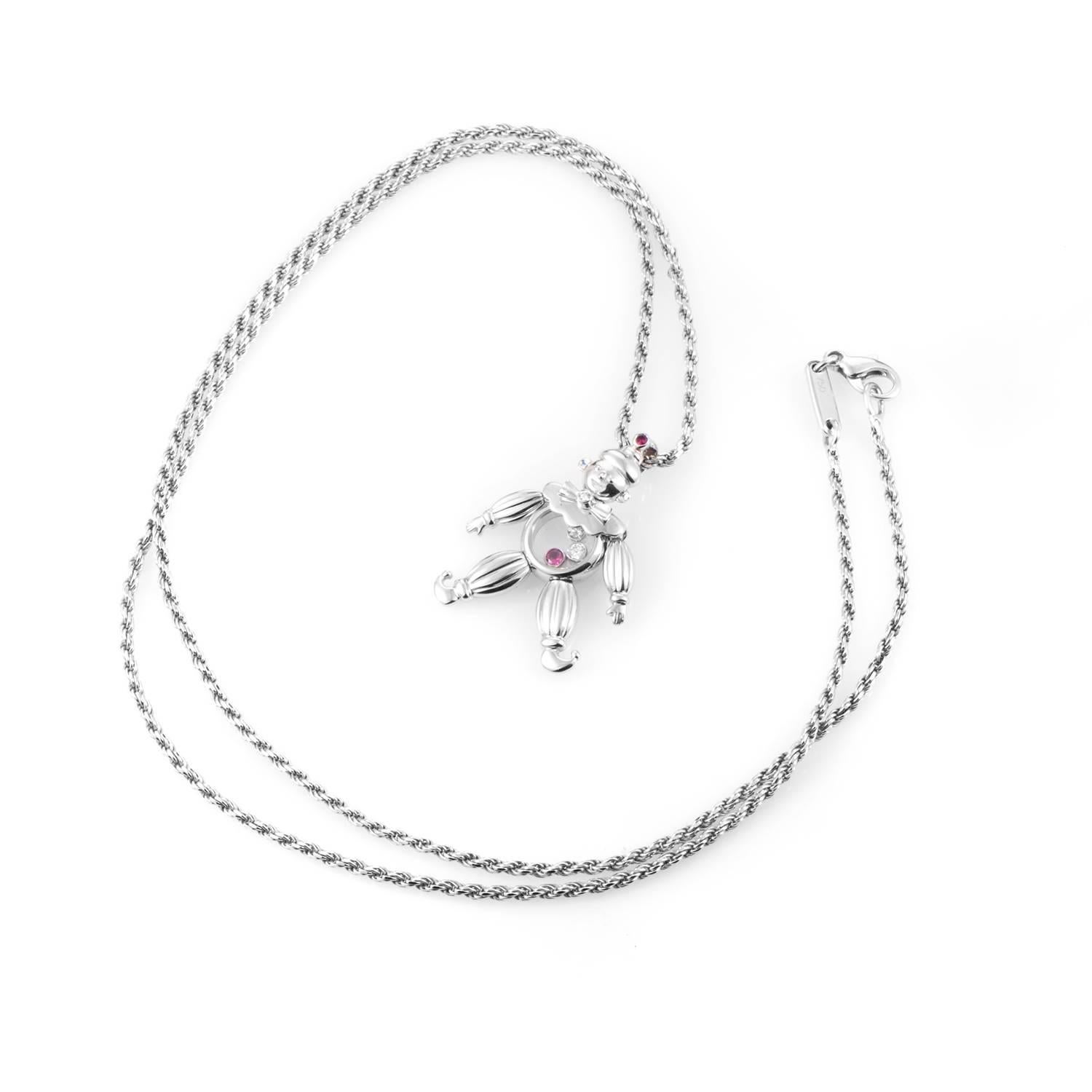 A nostalgic piece by Chopard, this playful clown necklace is a whimsical yet sophisticated 18K white gold necklace and pendant. The palma chain is an intriguing base for this charming clown with bezel set diamonds and rubies that tinkle against each