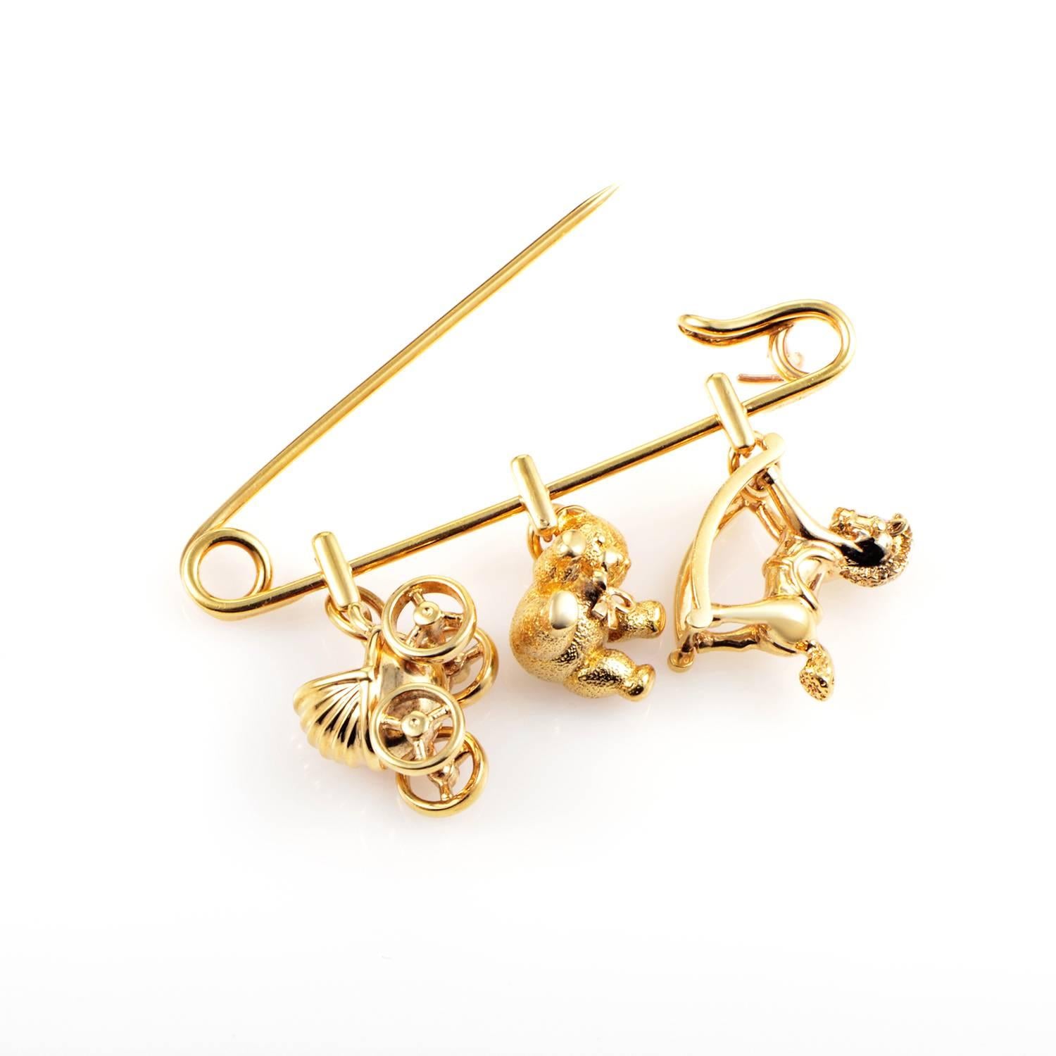 An adorable composition of charms with an overall spirit reminiscent of sweet childhood memories, this exceptional charm pin from Cartier offers an alluring appearance characterized by the prestigious warm radiance of 18K yellow gold.
Included