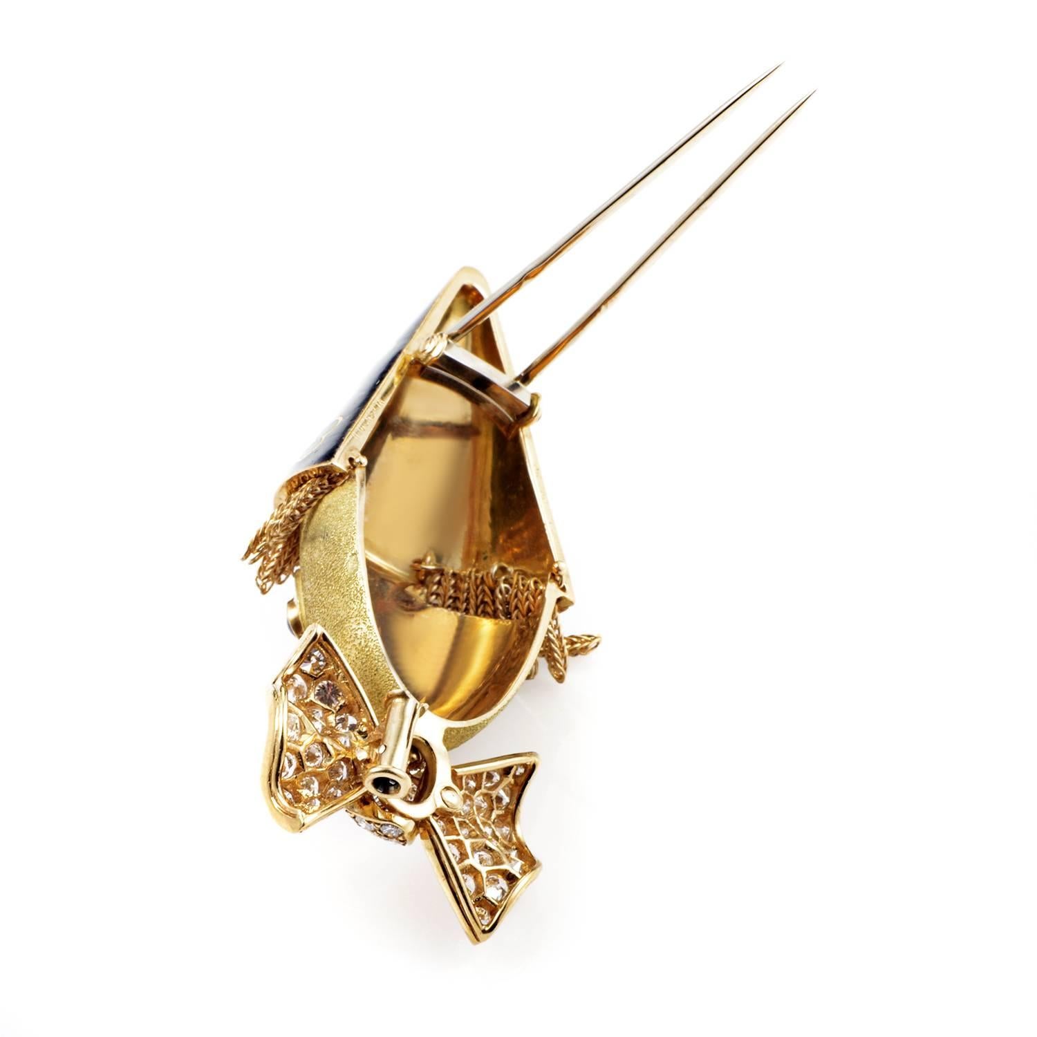 A refreshing and adorable design employing the ever-appealing motif of a clown, this lovely pin from Boucheron is made of prestigious 18K yellow gold and adorned with glittering diamonds totaling approximately 2.00 carats as well as two nifty