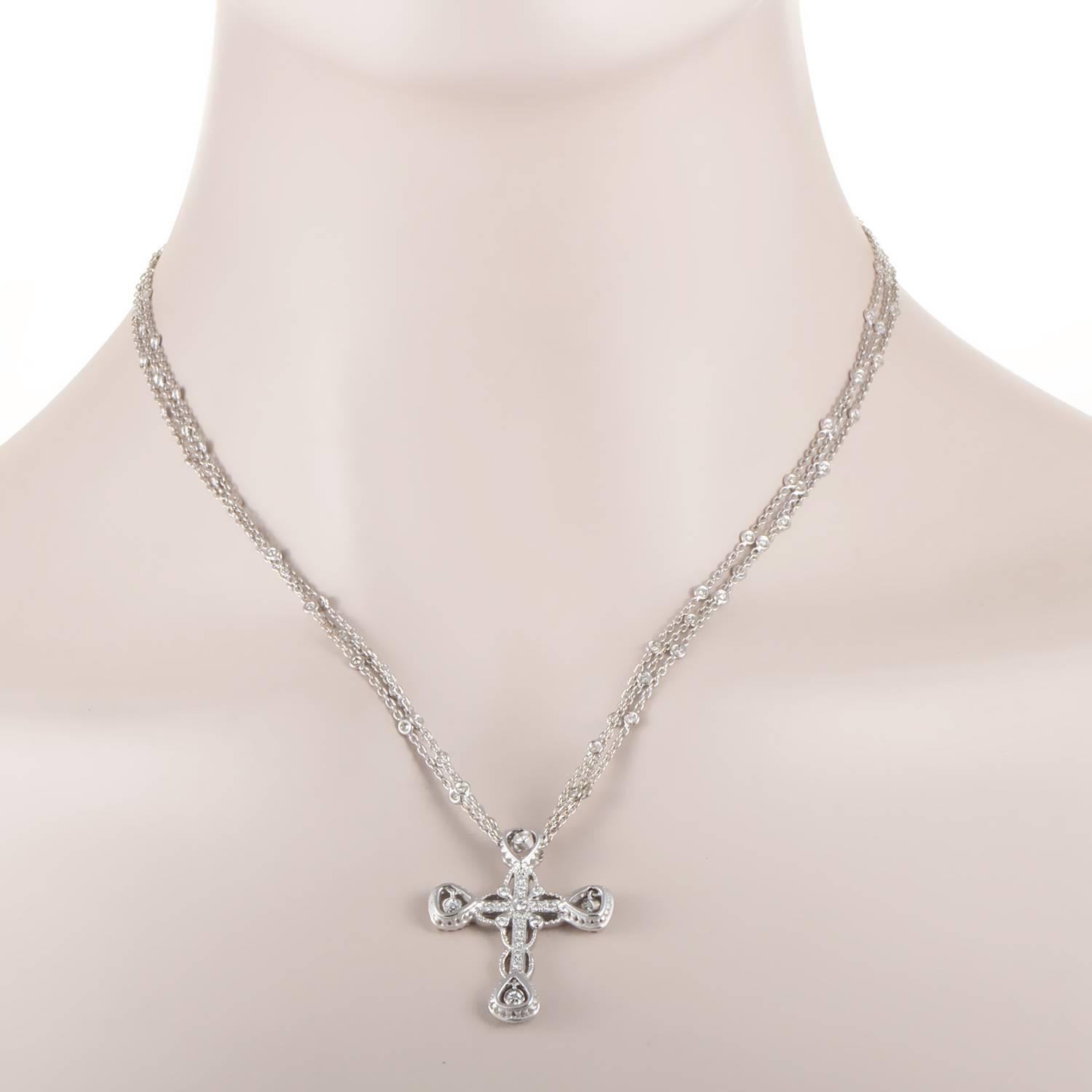 A magnificently graceful and ornate interpretation of the powerful symbol of a cross, this exceptional 18K white gold necklace from Doris Panos boasts a marvelous pendant embellished with 1.80 carats of glistening diamonds for a wonderfully bright