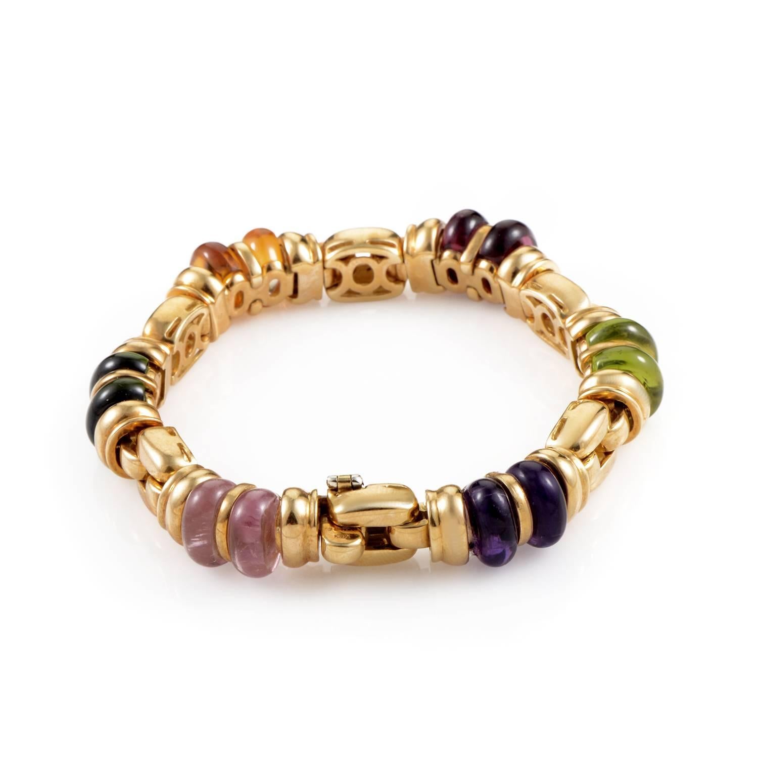Enhancing the charming appeal of 18K yellow gold through an exuberant and tasteful selection of multi-colored gems, Bulgari adorned this exceptional bracelet with delightful amethysts and pink tourmalines and splendid peridots and tourmalines as