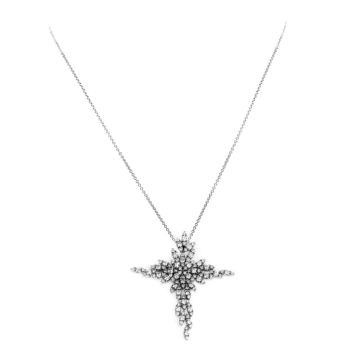 Bursting outwards from a densely-set glittering center, fascinating diamonds totaling 3.10 carats exude their prestigious brilliance and grace the pendant with a form that resembles a cross in this exceptional 18K white gold necklace from Pasquale