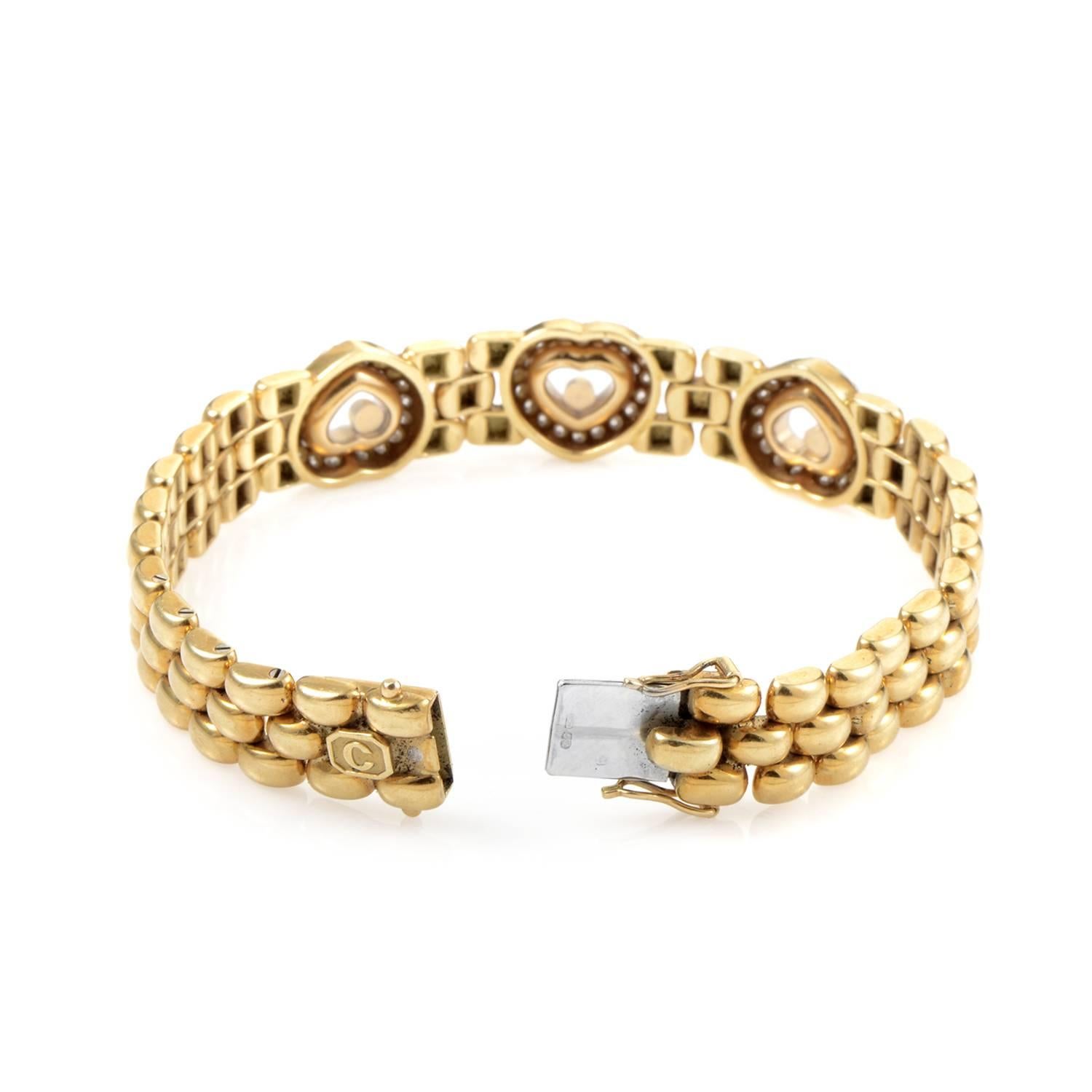 Producing an irresistible feel of traditional luxury through its thick links made of gleaming 18K yellow gold, this charming bracelet from Chopard also features sparkling diamonds weighing in total approximately 2.00 carats arranged in three lovely