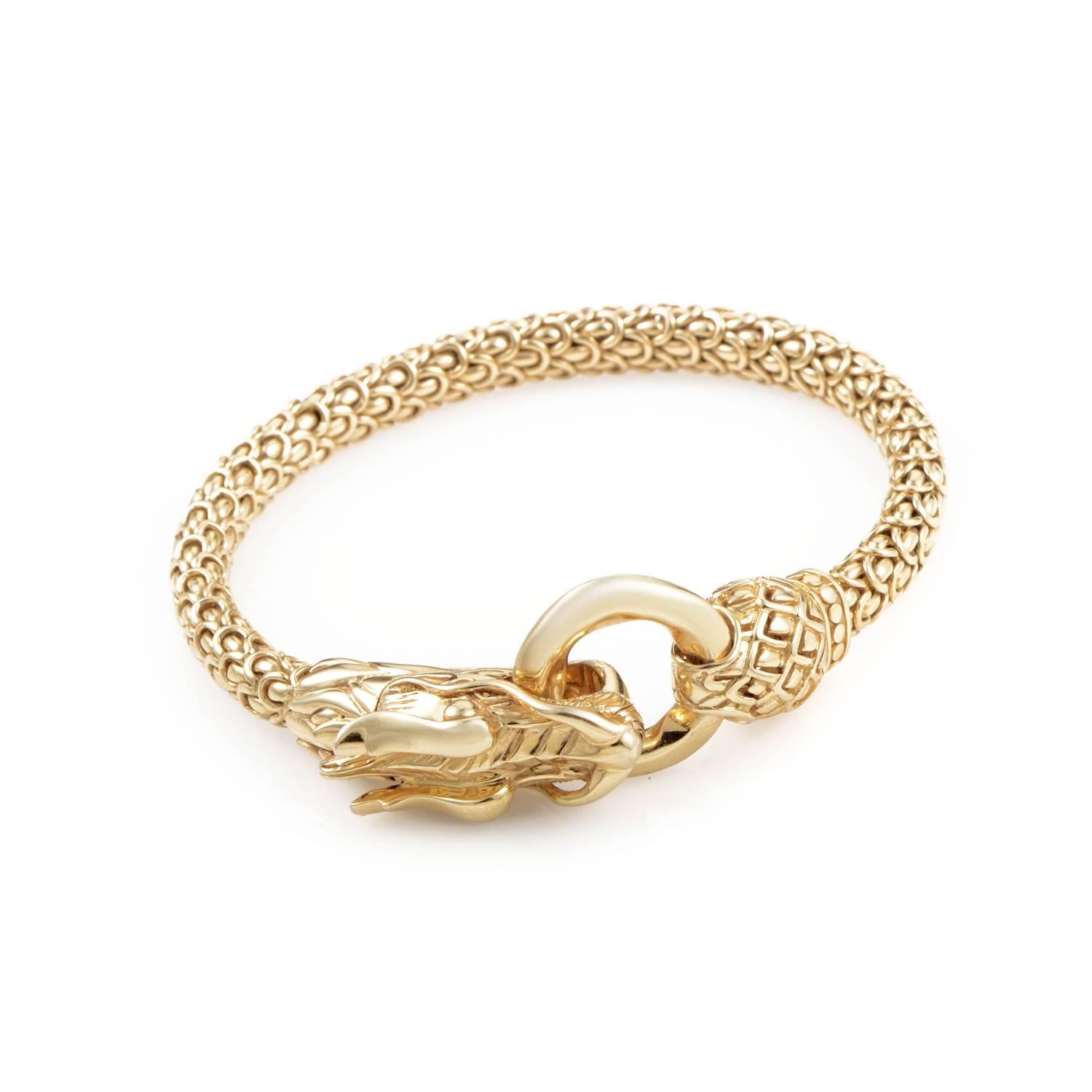 An item of extraordinary beauty and intriguing design, this astonishing bracelet from John Hardy boasts the daring motif of a dragon with its head securing the clasp and its supple body comprised of fascinatingly created 18K yellow gold