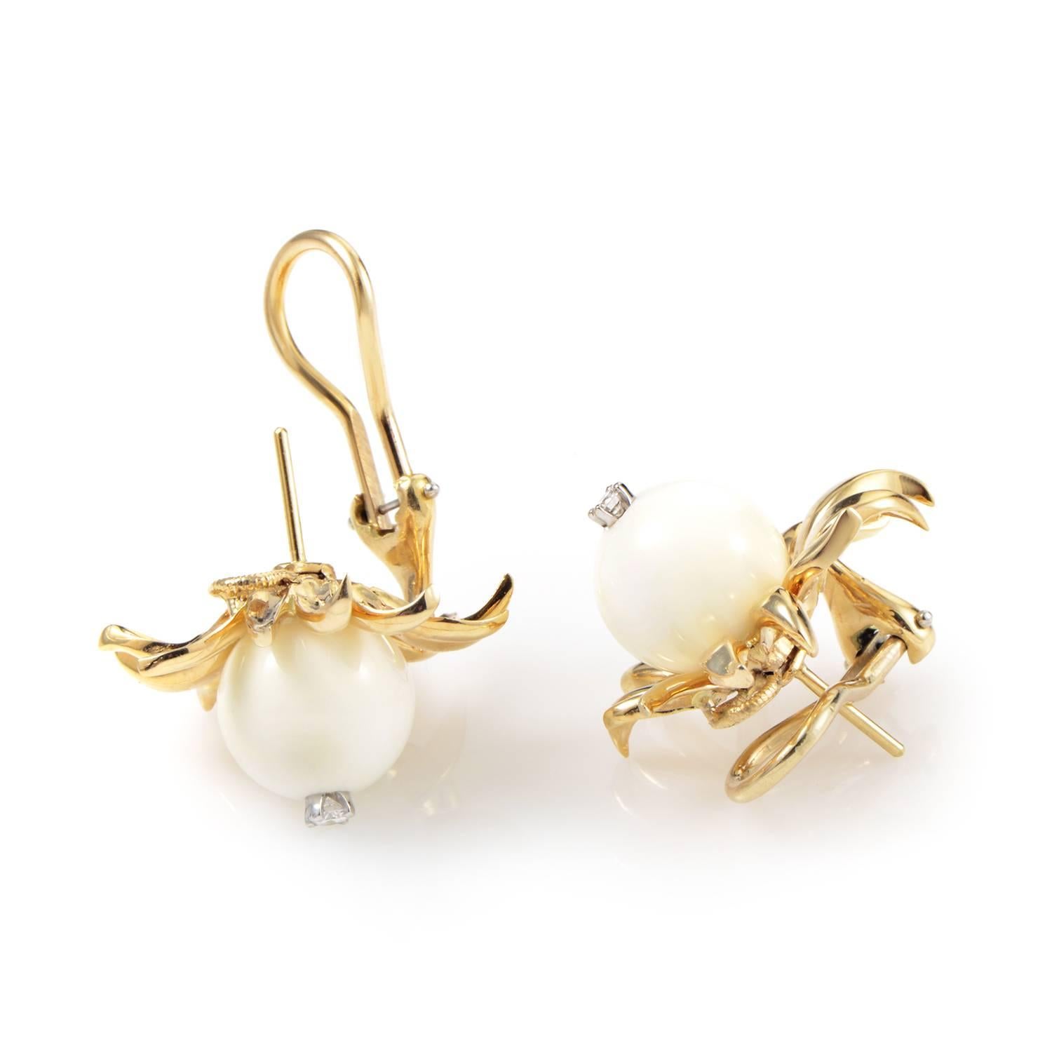 Unfolding like a blooming flower to reveal the angelic beauty and delightful softness of magnificent white onyx stones complemented by sparkling diamonds totaling 0.10ct, the 18K yellow gold sets a wonderful tone in these charming earrings designed