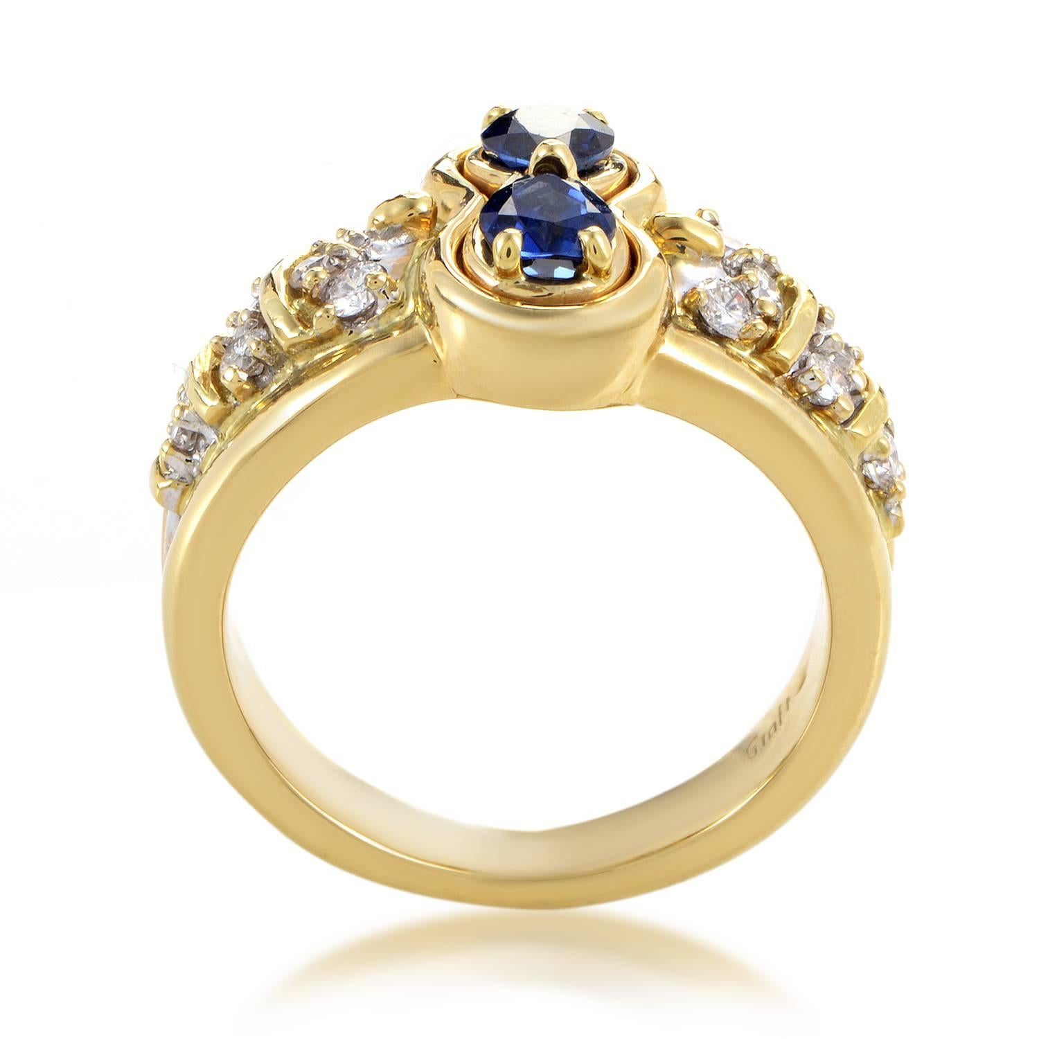 A compelling item of sophisticated design and exceptional luxurious allure, this stunning ring from Graff is made of gleaming 18K yellow gold and embellished with 0.55ct of diamonds, while regal sapphires on top weigh in total approximately 2.00