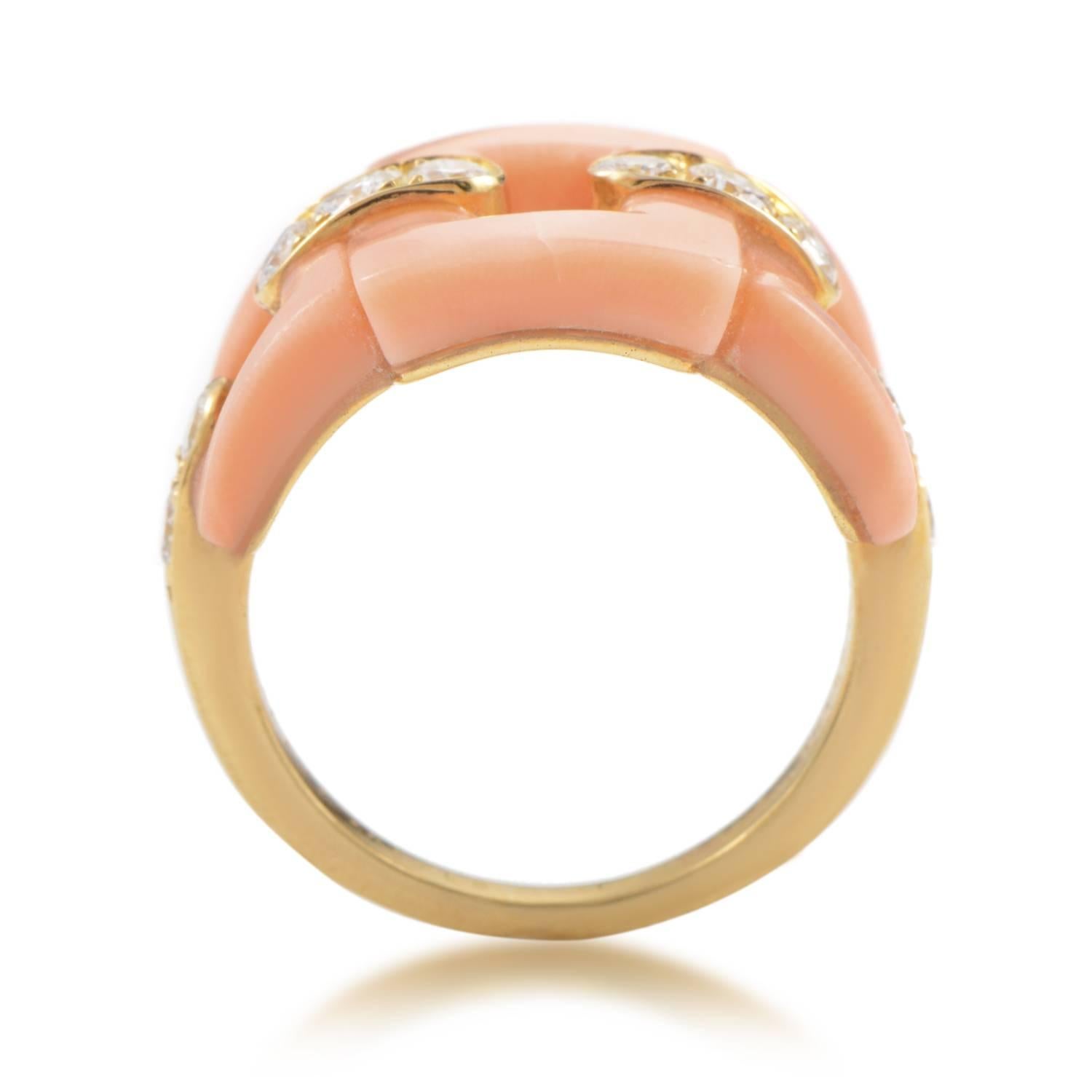 Seemingly comprised of adorable links made of delightful pink coral stone, the top of this spellbinding 18K yellow gold ring from Van Cleef & Arpels also boasts 0.58ct of scintillating diamonds for a gorgeous sight.
Included Items: Manufacturer's