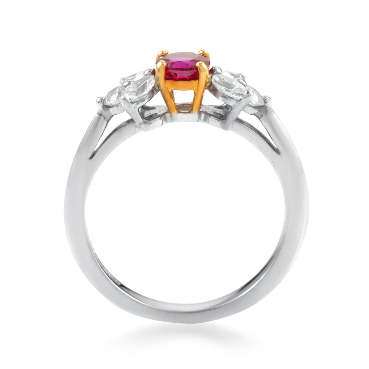 Tastefully complemented by the radiant 18K yellow gold to provide excellent balance in a design dominated by splendid platinum and bright diamonds weighing in total 0.20ct, the passionate ruby weighs 0.50ct and lends its fabulous nuance to this