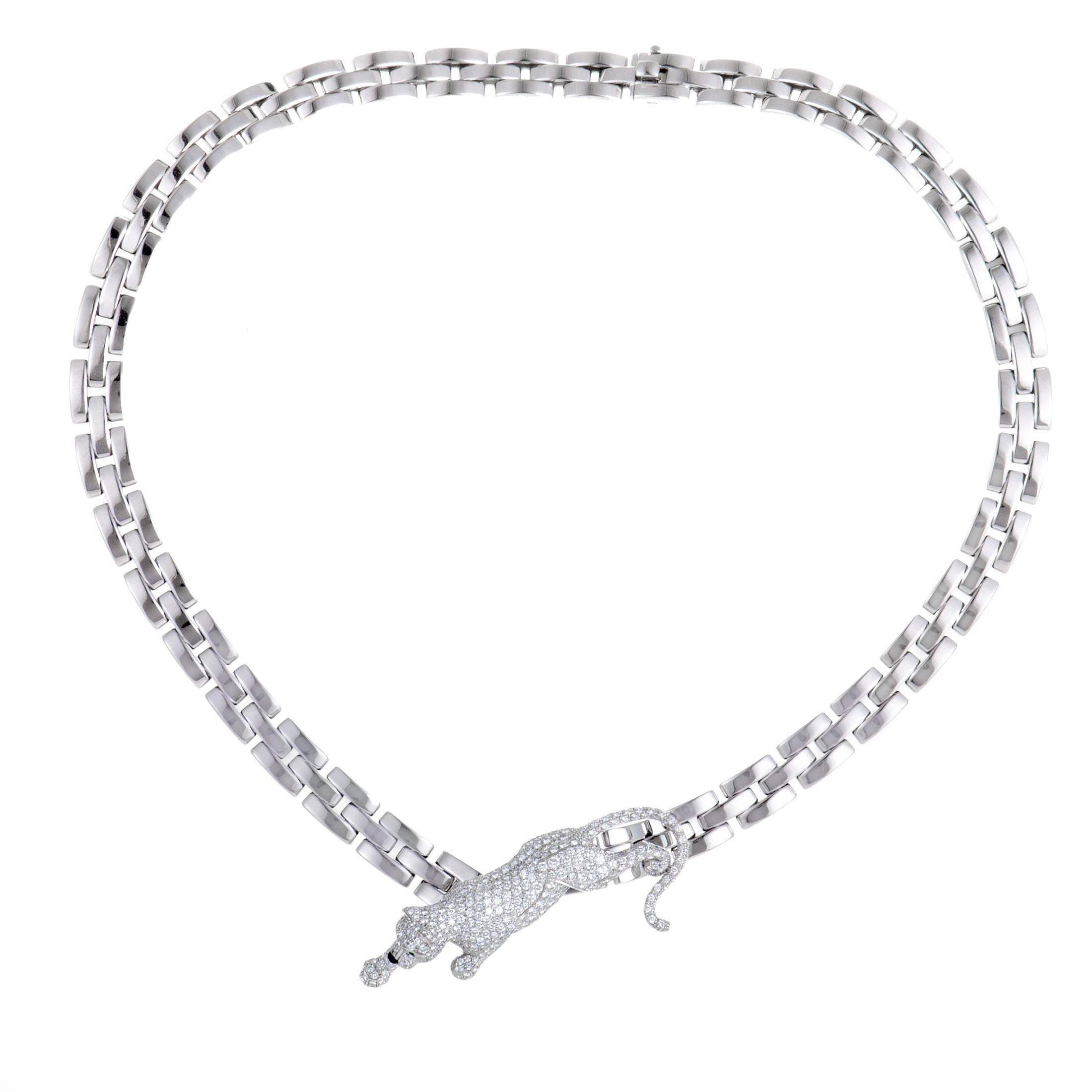 Tastefully combined with a splendidly elegant chain of shimmering 18K white gold, the brand's emblematic motif of the majestic panther stands out in glorious fashion at the center of this magnificent necklace from Cartier, owing to the luscious