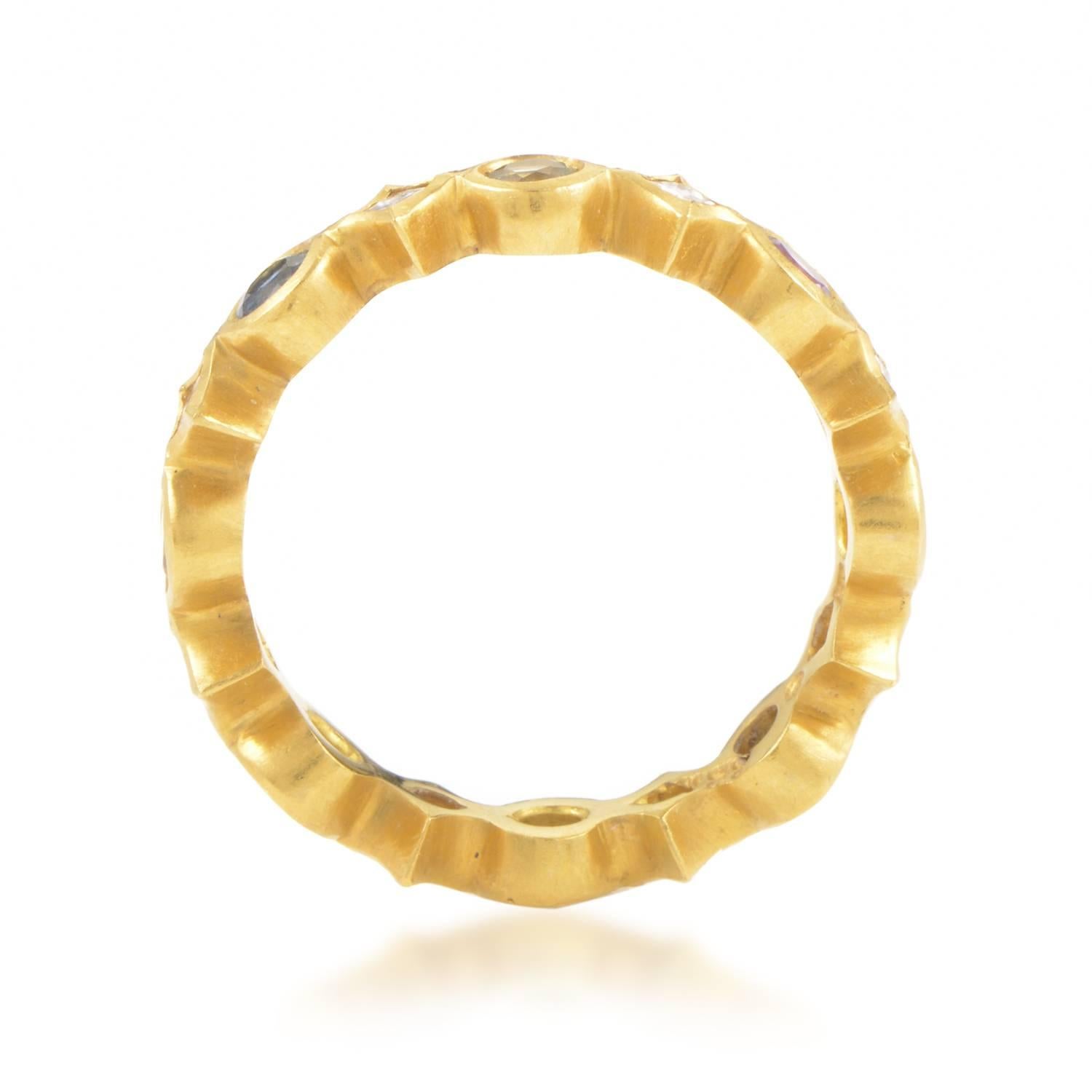Designed in an offbeat manner to embrace multicolored sapphires totaling 0.70ct and glistening diamonds weighing in total 0.30ct into its radiant warmth, the 18K yellow gold sets a romantic tone in this lovely ring from Cathy Waterman.
Ring Size: