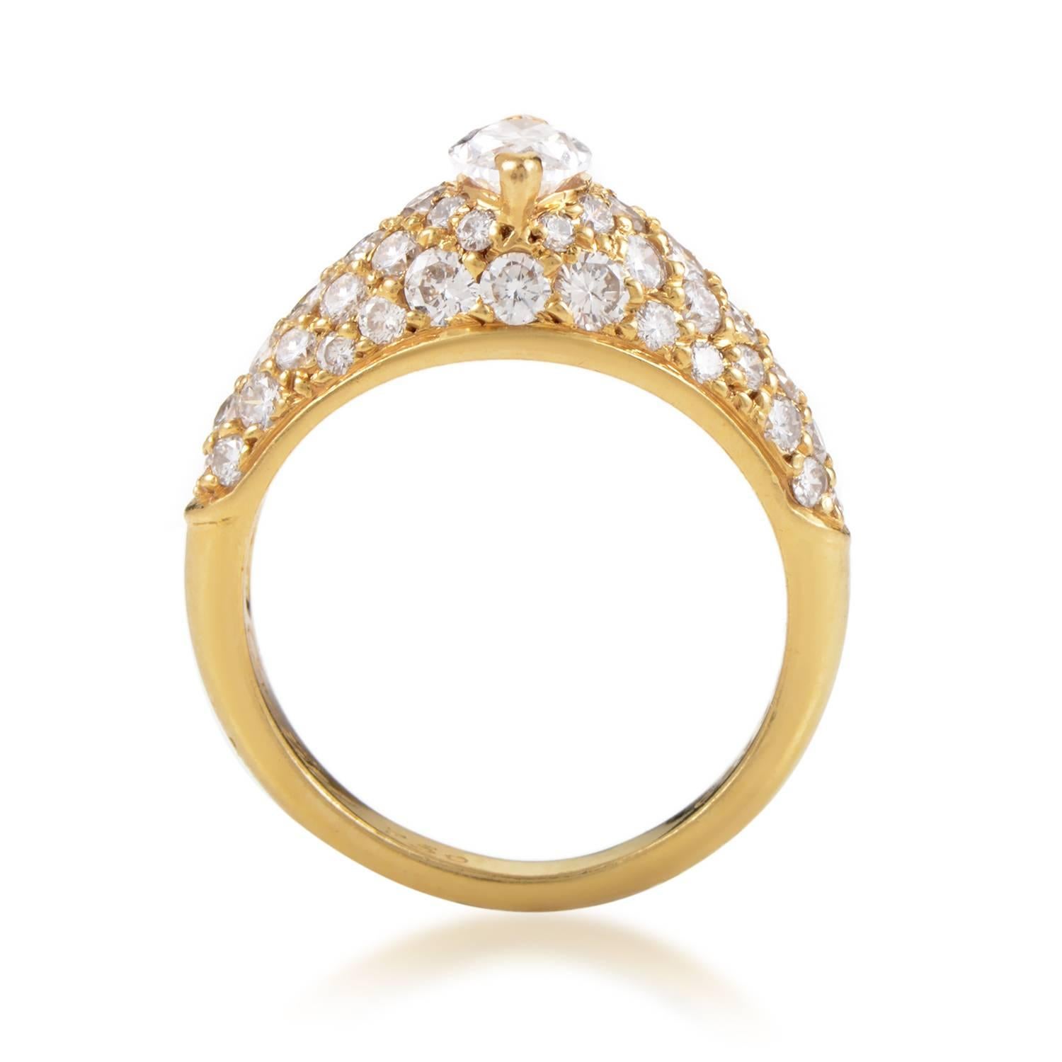 Leading up to the stunning central G-color diamond of VS quality weighing 0.60ct, lustrous smaller diamonds totaling 1.25 carats are arranged neatly upon the fabulously radiant 18K yellow gold in this gorgeous ring from Cartier.
Ring Size: 4.75
Band