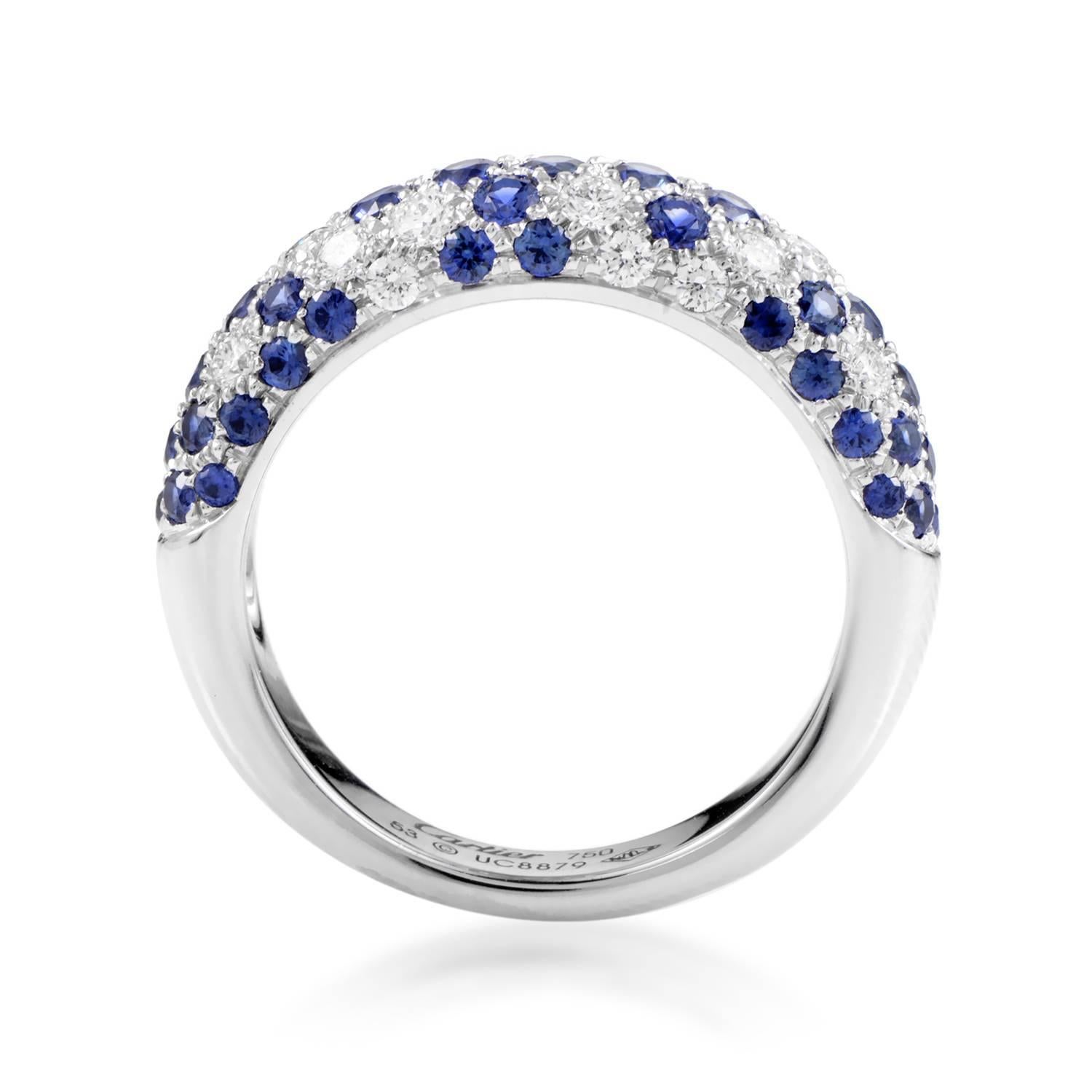 Scattered along a gloriously glistening sea of diamonds weighing in total 0.60ct, magnificent sapphires totaling 1.00 carat lend their pleasant color to this splendid 18K white gold band from Cartier.
Ring Size: 6.75(53)
Band Thickness: 3 mm
Ring