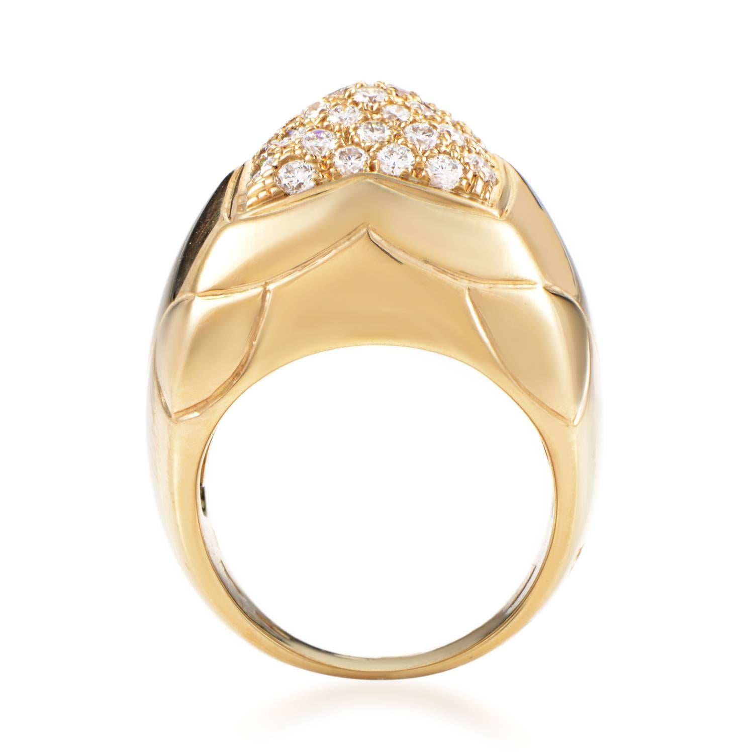 Instantly recognizable as one of the brand's esteemed aesthetic features, the compelling pyramidal shape of this exceptional ring from Bulgari is topped off by sparkling diamonds against the spotless surface of luxurious 18K yellow gold.
Ring Size:
