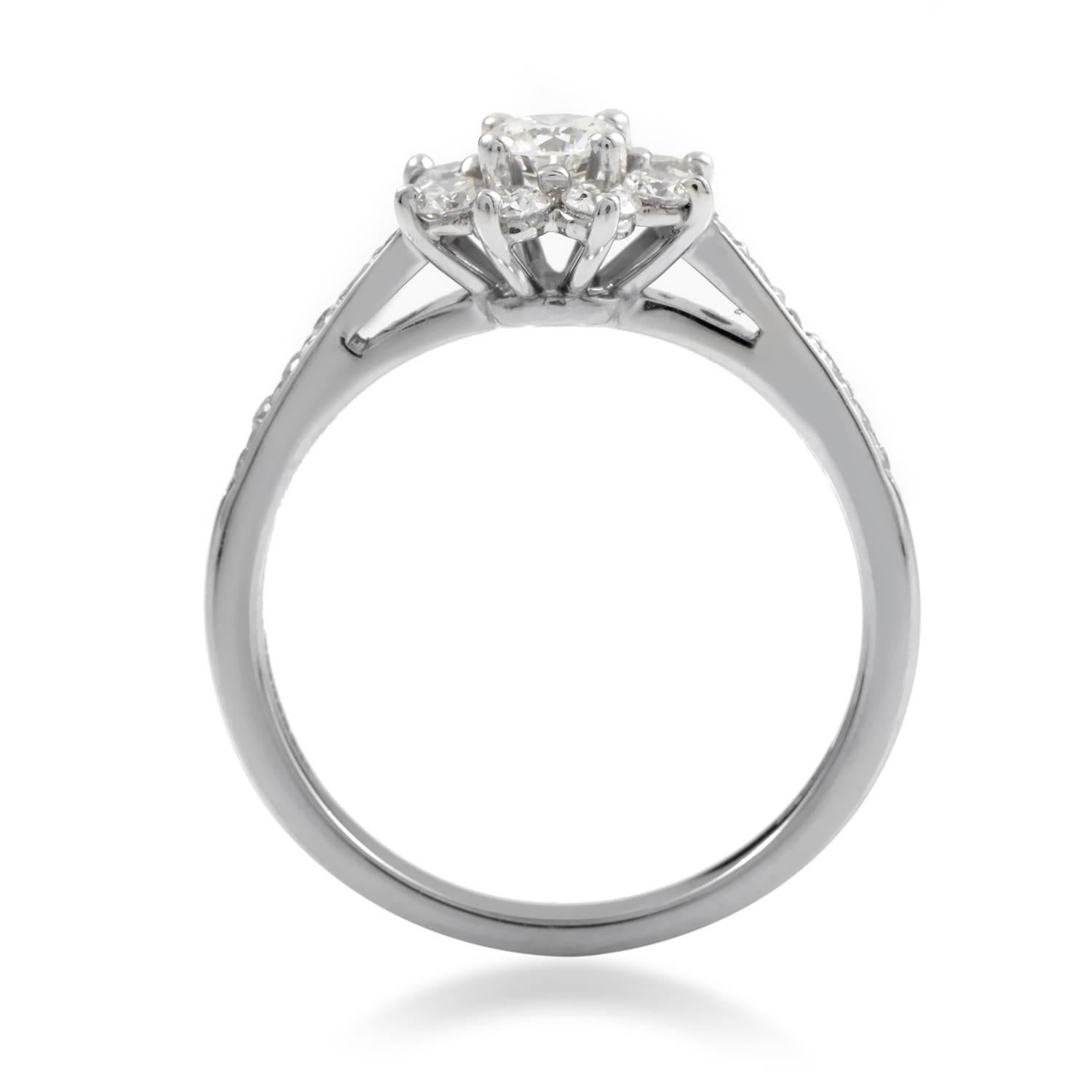 Nothing says class like a ring from Tiffany & Co. This platinum ring from the esteemed brand is made of platinum and features a gorgeous flower comprised of .80ct of F color, VVS1 clarity diamonds.
Ring Size: 5.75 (50 7/8)
Ring Top Dimensions: 8 x