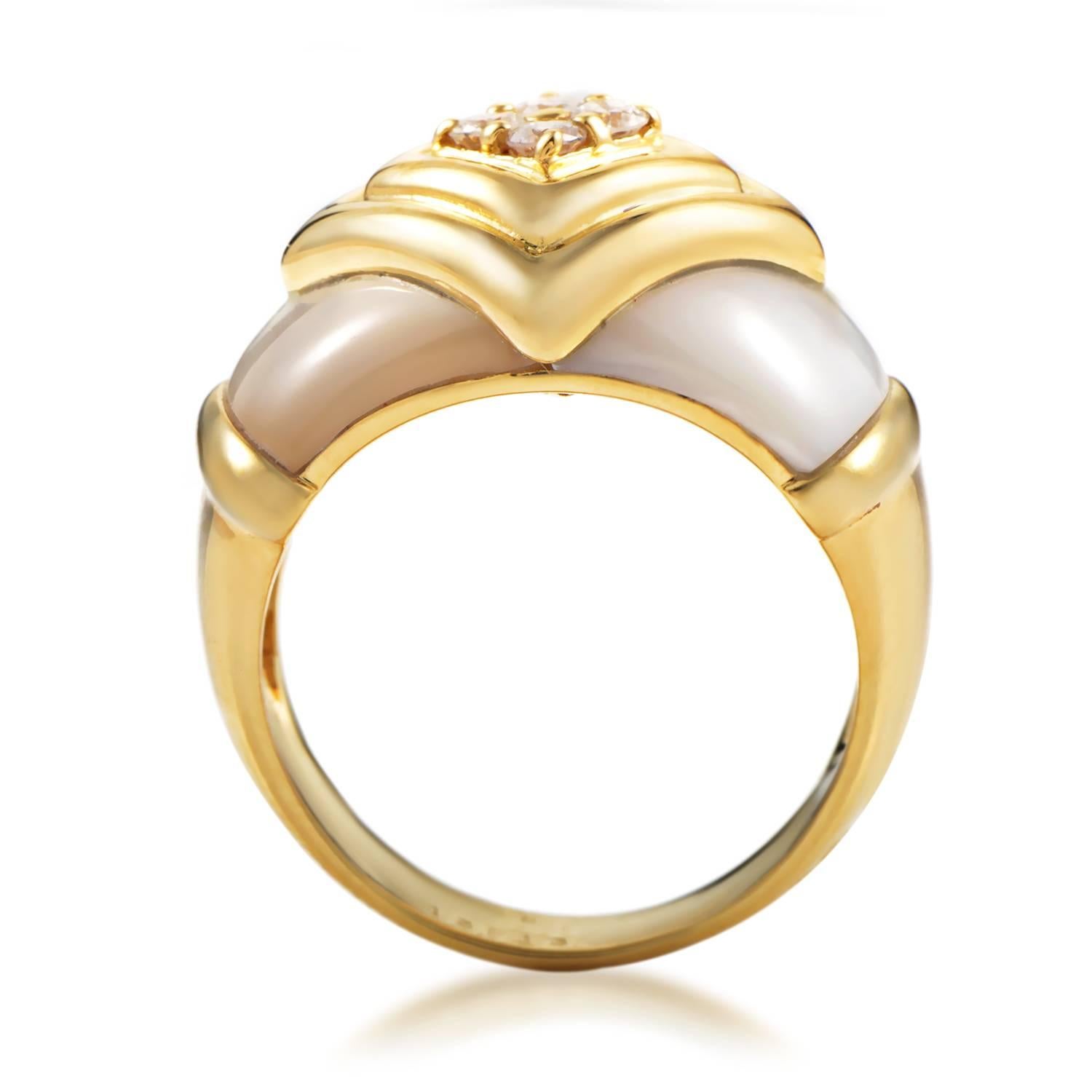 This band ring from Van Cleef & Arpels exudes prestige and class. The ring is made of 18K yellow gold and is accented with mother of pearl and four diamonds, weighing in total .20cttw.
Ring Size: 6.25 (52 1/8)
Ring Top Dimensions: 20 x 15mm
Band