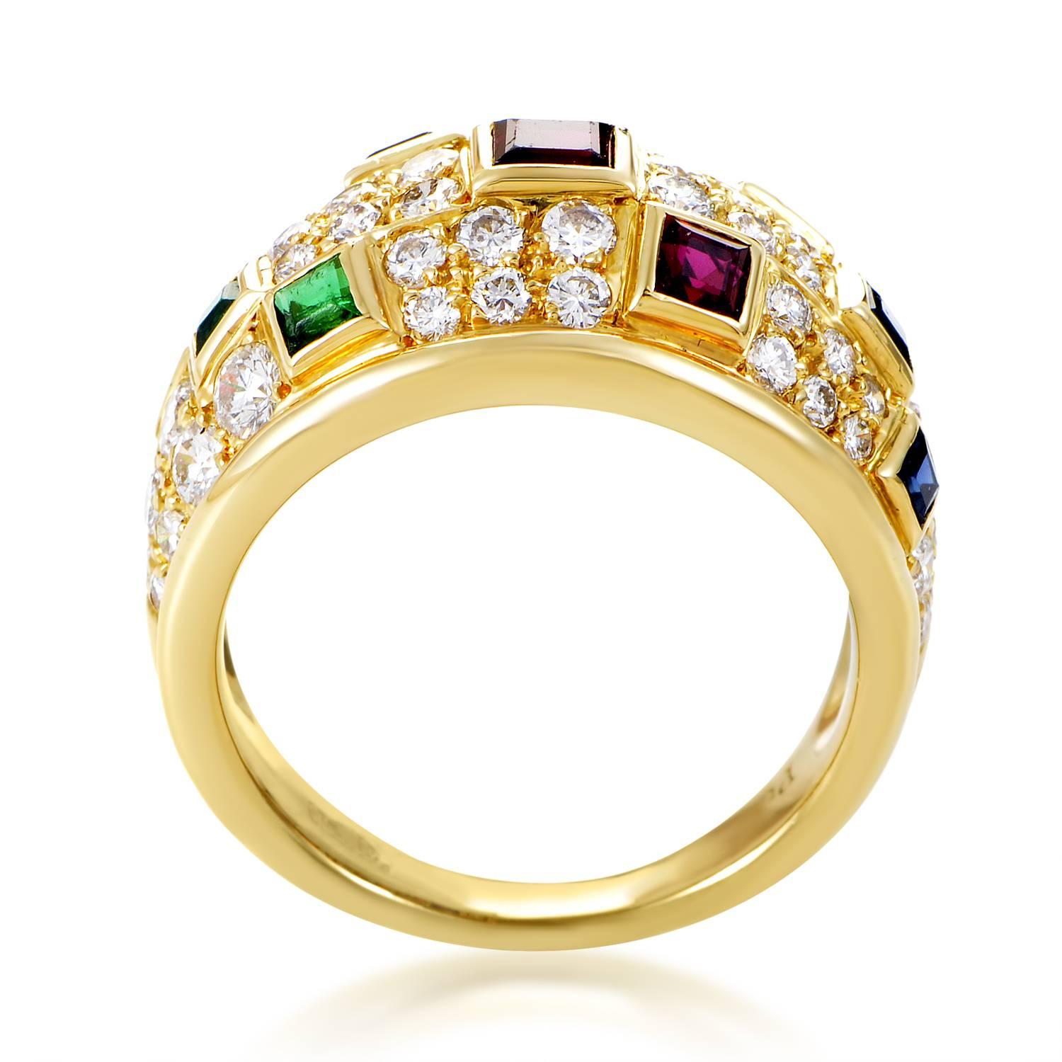 A rainbow of precious gemstones is the hallmark of this decadent ring from Piaget. The ring is made of 18K yellow gold and is paved with 1.35ct of diamonds. Lastly, dispersed throughout the design are colored gemstones including; .30ct of emeralds,