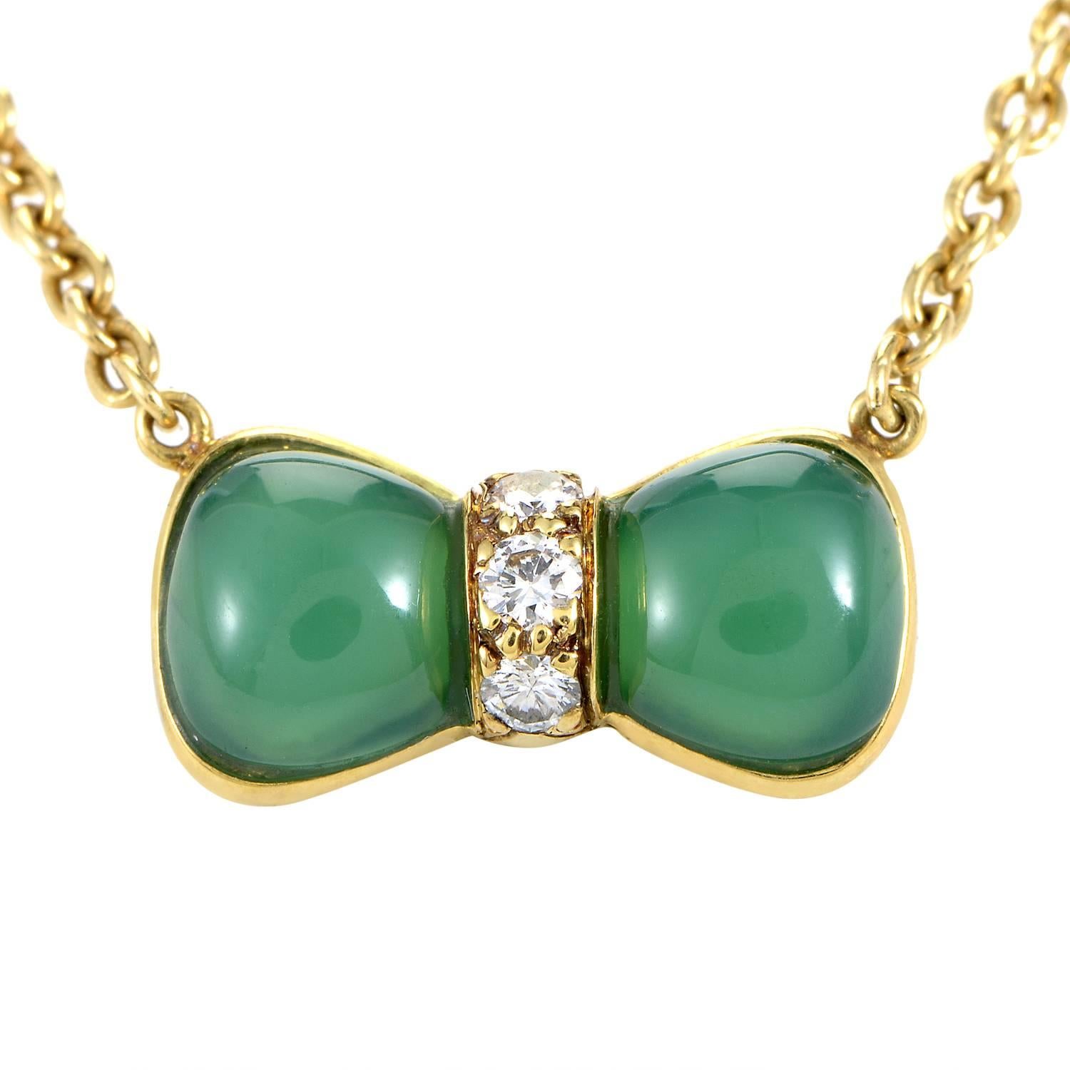 This adorable pendant necklace from Van Cleef & Arpels is absolutely delightful! The necklace is made of 18K yellow gold, and features a bow-shaped pendant set with .15ct of diamonds and gorgeous green jade.
Pendant Dimensions: 0.63 x