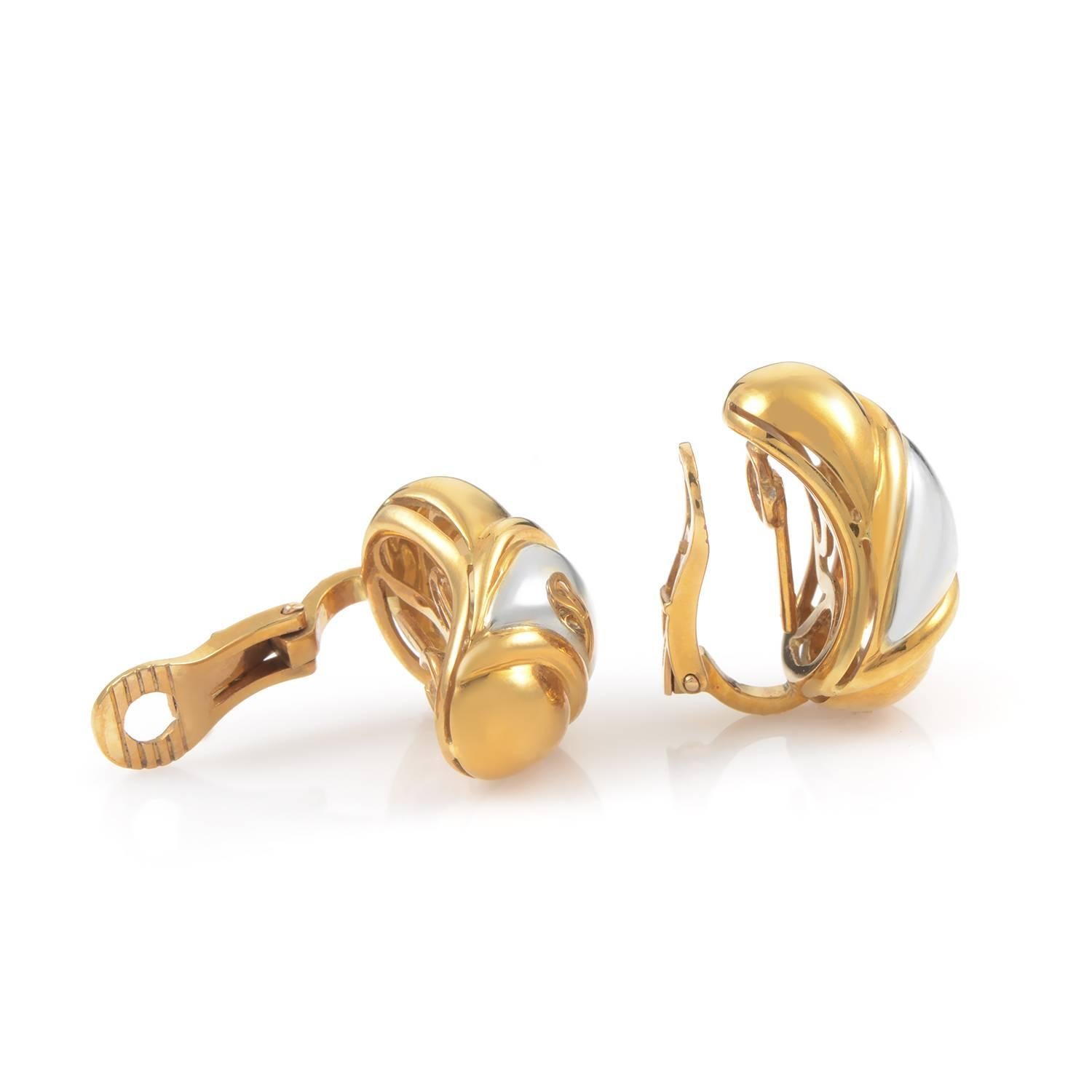 Golden and glorious are the perfect words to describe this pair of earrings from Bulgari. The earrings are made of primarily 18K yellow gold and are accented with 18K white gold.
Included Items: Manufacturer's Box