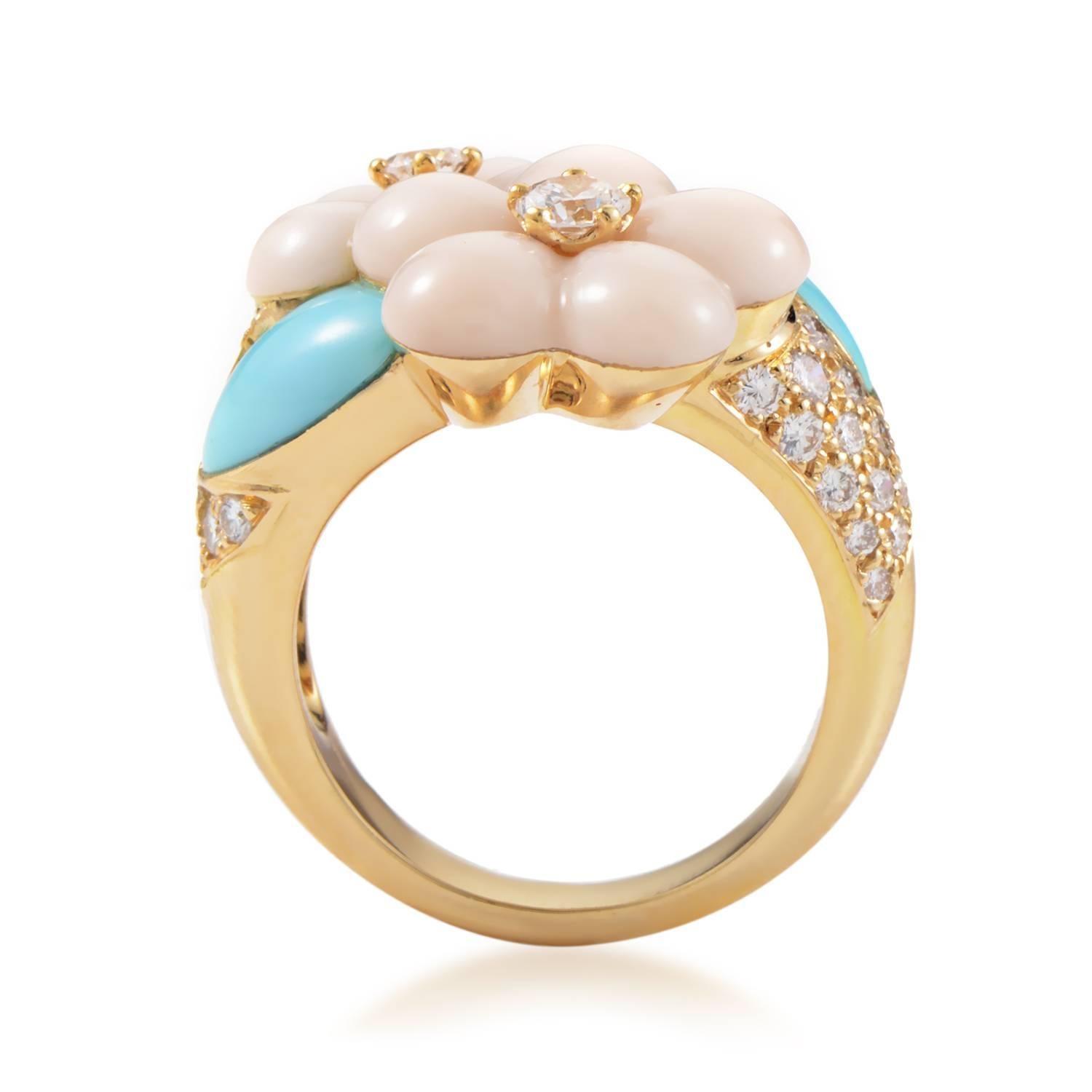 This ring from Van Cleef & Arpels is absolutely gorgeous. The ring is made of 18K yellow gold and features shanks set with .96ct of E color, VVS1 clarity diamonds. Lastly, coral flowers with diamond centers and turquoise leaves add a pop of color to