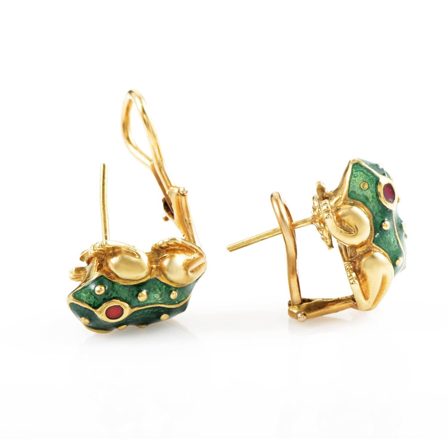 With gorgeous green enameled body and striking ruby eyes, the wonderful shapes of frogs come to life in these exceptional earrings from David Webb, while luxurious 18K yellow gold gives off a fabulous radiant allure.