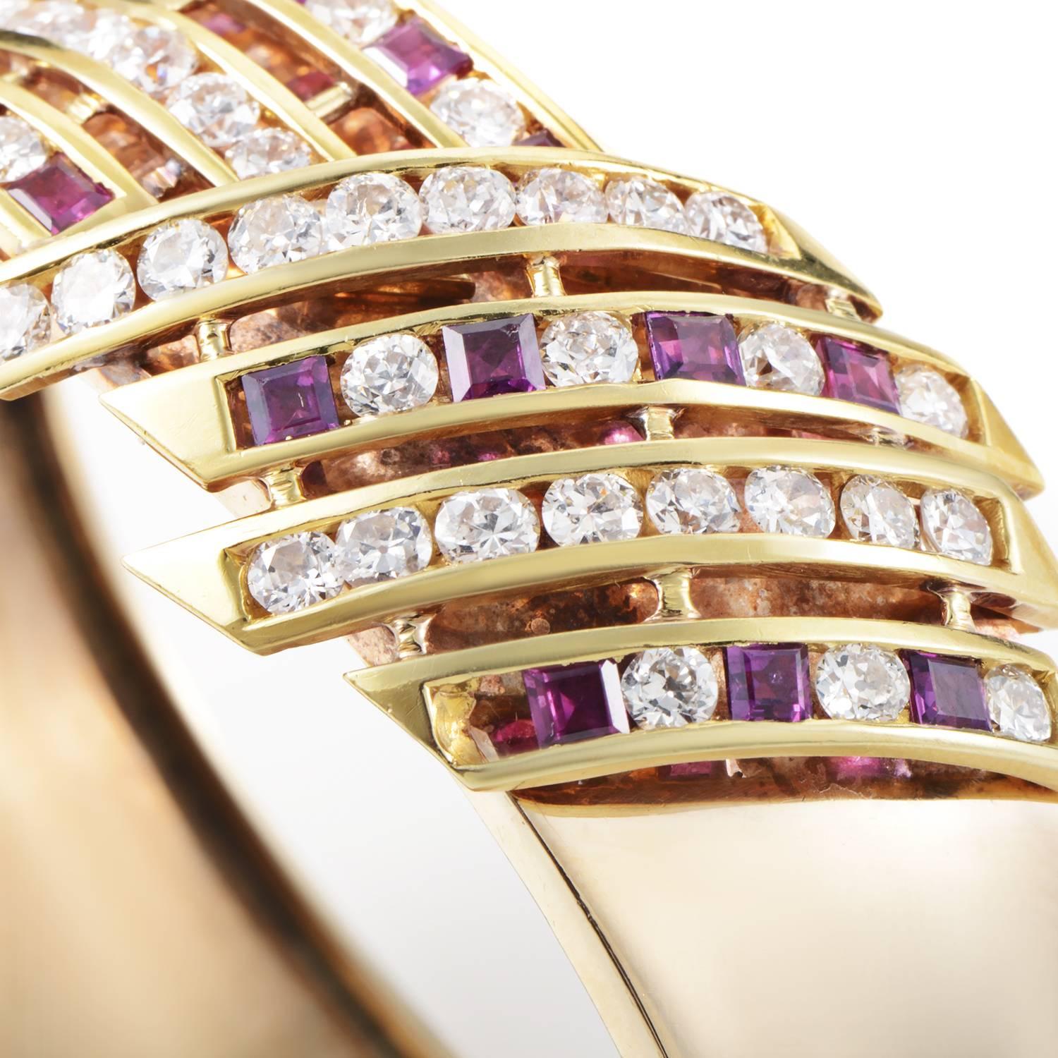The unblemished gleam and ideally smooth curve of 14K yellow gold is broken by a glamorous decoration in the form of gorgeous rubies weighing in total 2.90 carats and lustrous diamonds totaling approximately 4.75 carats in this outstanding and
