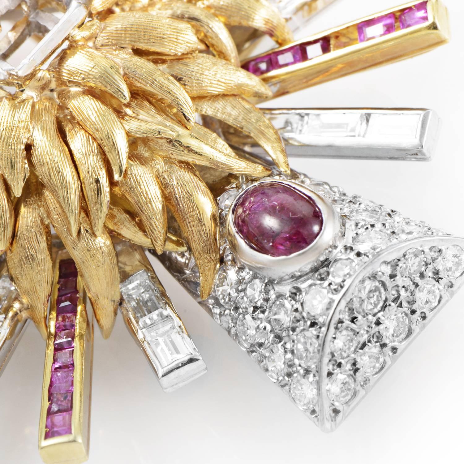 Evolving outwards in fascinating fashion from the majestically shaped and intricately finished 18K yellow gold, this exuberant brooch from Erwin Pearl also features splendid platinum while embellished with sparkling diamonds totaling approximately