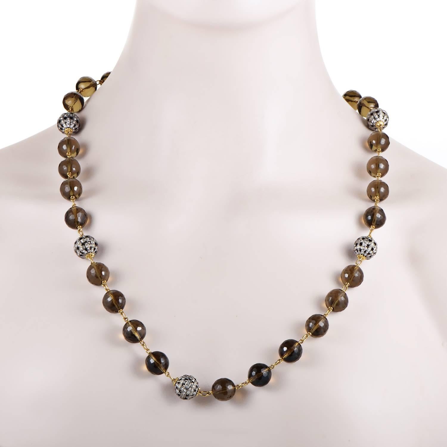 The subtle chain made of radiant 18K yellow gold is lined with gorgeous spherical smoky topaz stones as well as enchanting round charms embellished with a total of 5.00 carats of sparkling diamonds in this astonishing necklace.