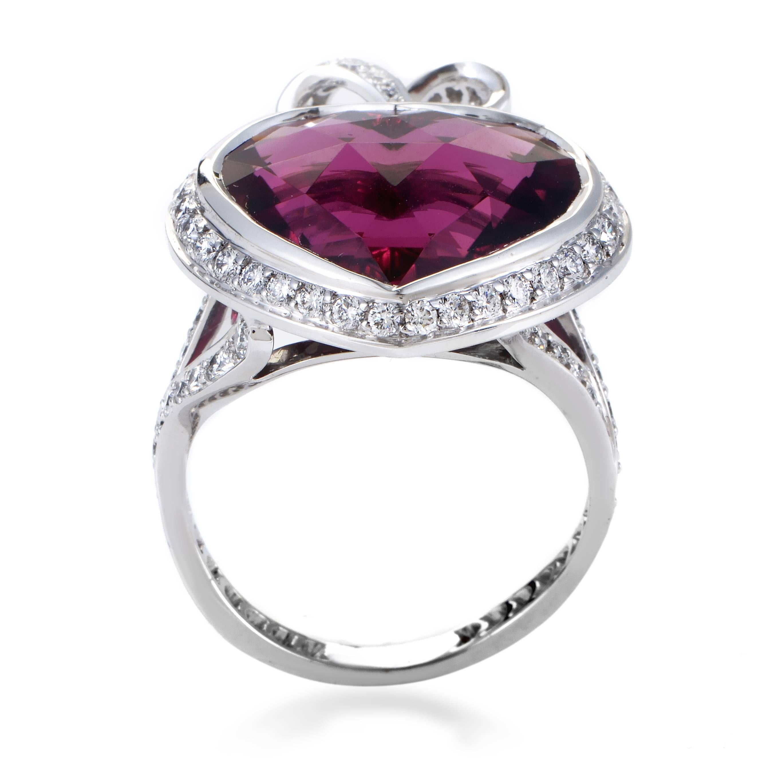 Provided excellent emphasis by the brilliantly bright combination of shimmering 18K white gold and resplendent diamonds weighing in total 1.40 carats, the romantic shape of a heart is given amazing depth and passionate nuance by the majestic pink