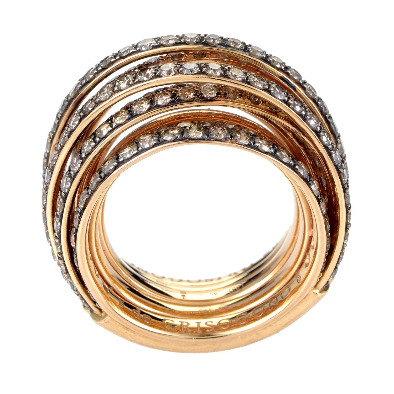 Countless bands of gorgeously radiant 18K rose gold merge to constitute the exceptional form of this outstanding ring from de Grisogono while the precious brilliance of diamonds totaling 5.44 carats adds a strong prestigious appeal.
Ring Size: 6.5