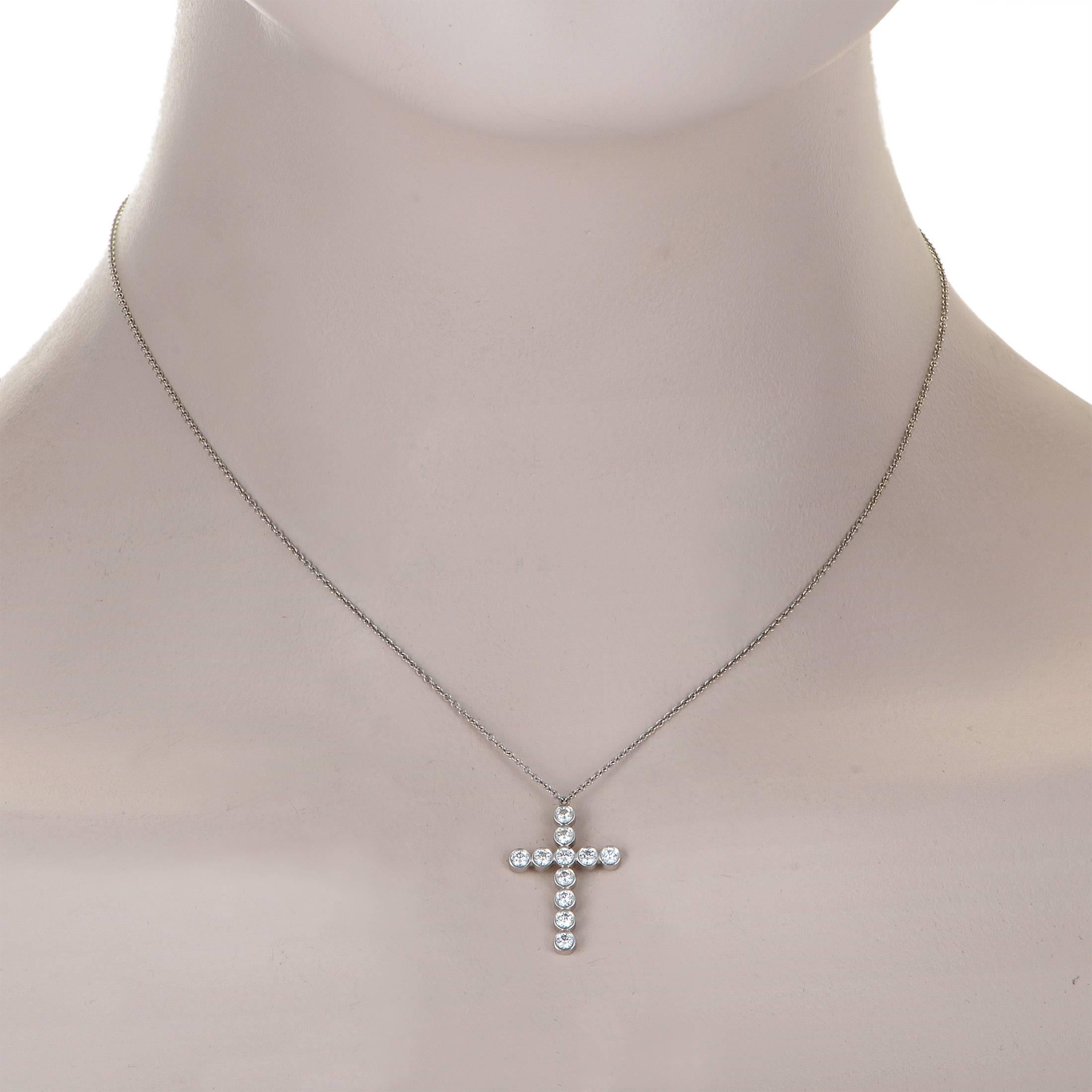 Given a mesmerizing visual effect by the addition of scintillating diamonds weighing in total 0.50ct, the astounding symbol of a cross is employed brilliantly in the pendant of this magnificent platinum necklace from Tiffany & Co.
Included Items: