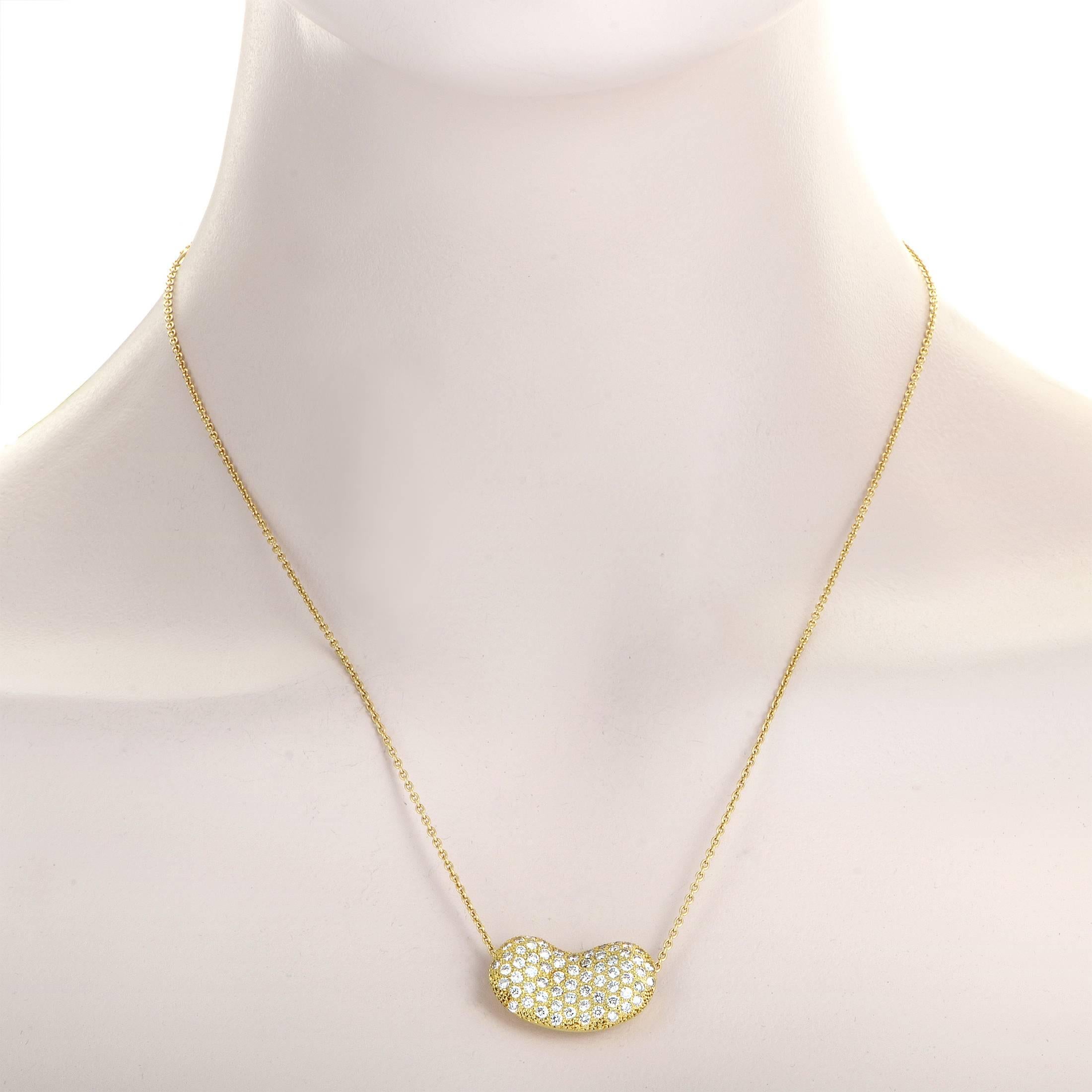 Relying on the tasteful blend of precious 18K yellow gold and lustrous diamonds weighing in total 2.04 carats to create an alluring sense of classic luxury, this marvelous necklace designed by Elsa Peretti for Tiffany & Co. offers a charming and