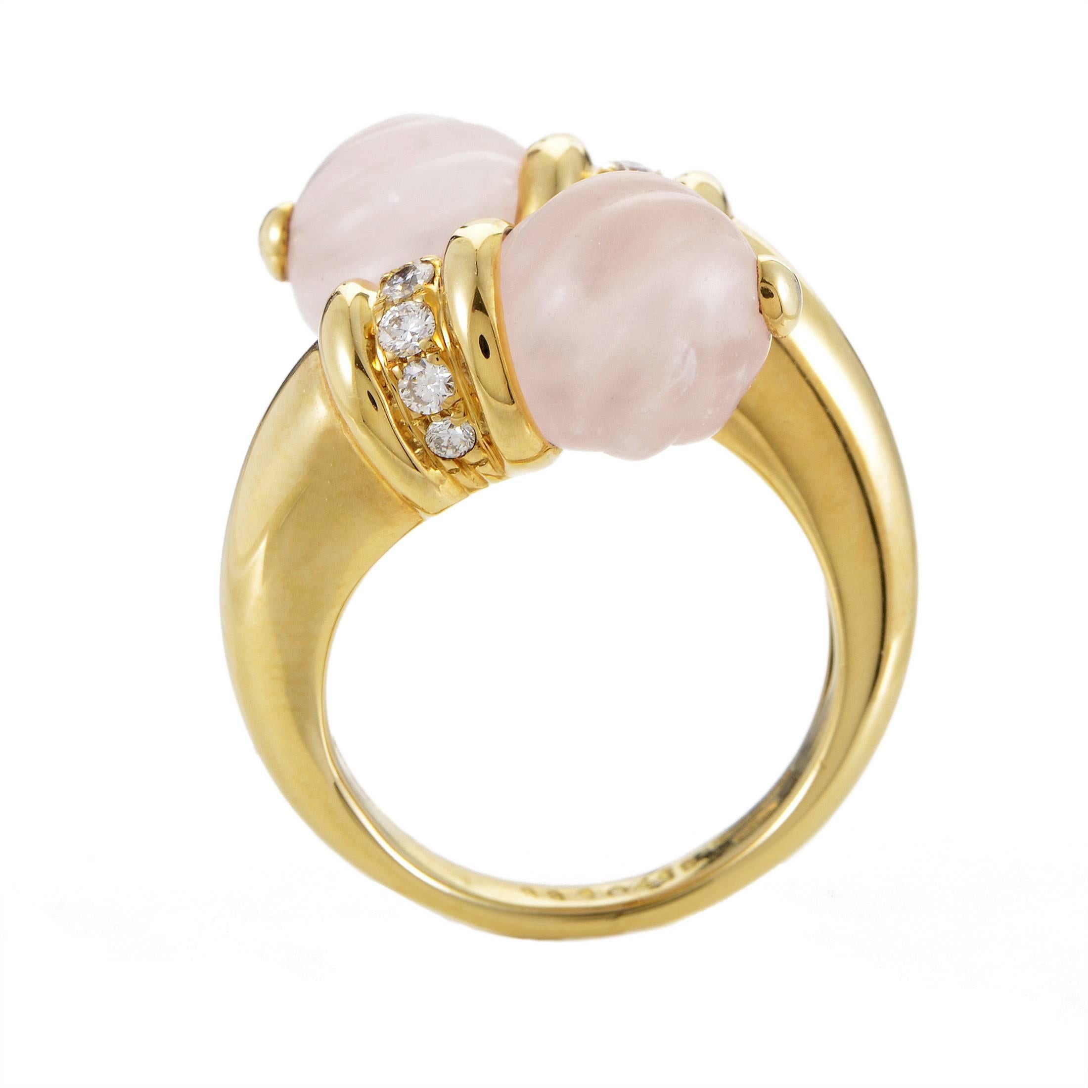 The immaculately gleaming surface of enchanting 18K yellow gold is brilliantly combined with delightful pastel nuance of marvelously shaped pink crystals in this gorgeous ring from Boucheron while glittering diamonds totaling 0.20ct add a touch of
